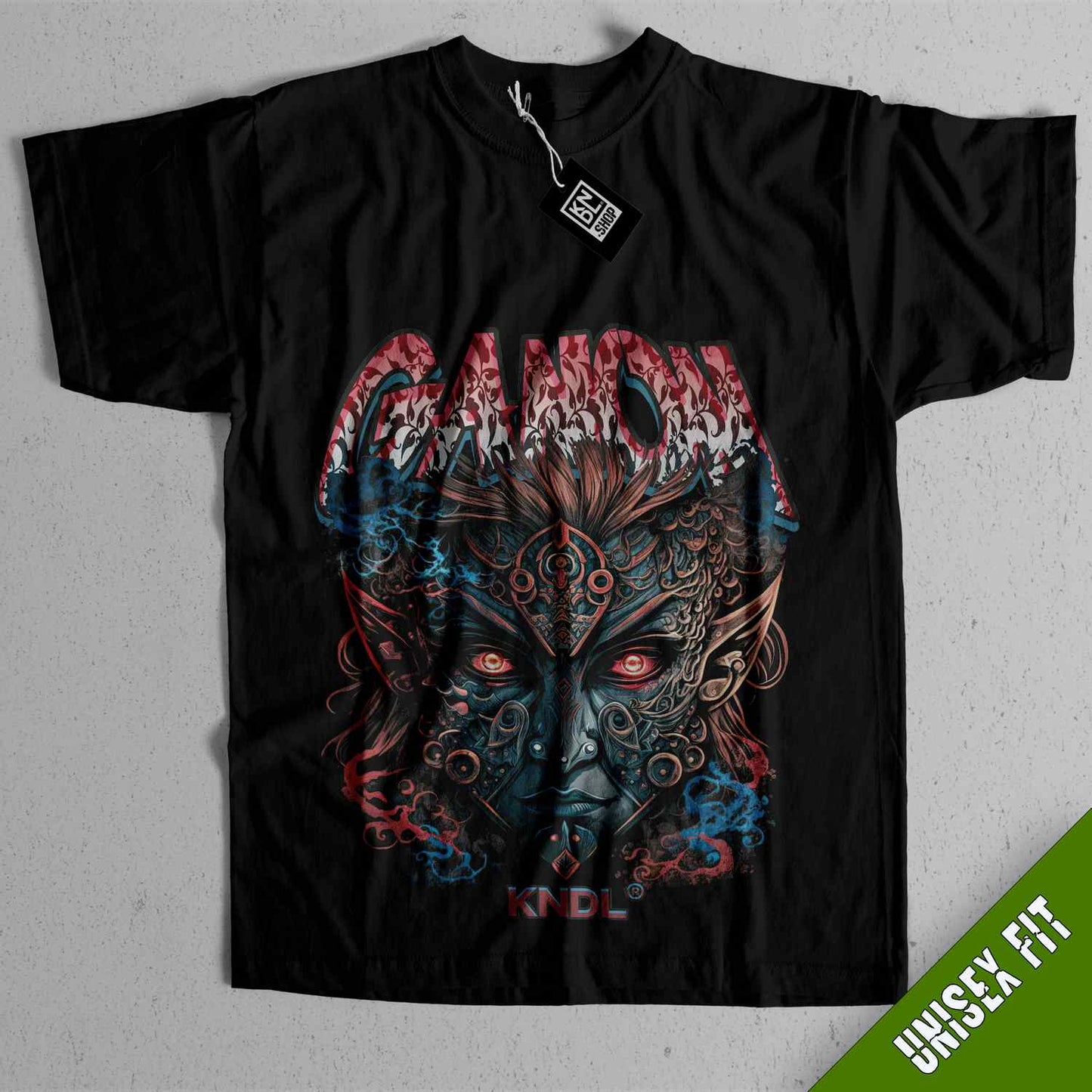a black t - shirt with an image of a demon on it