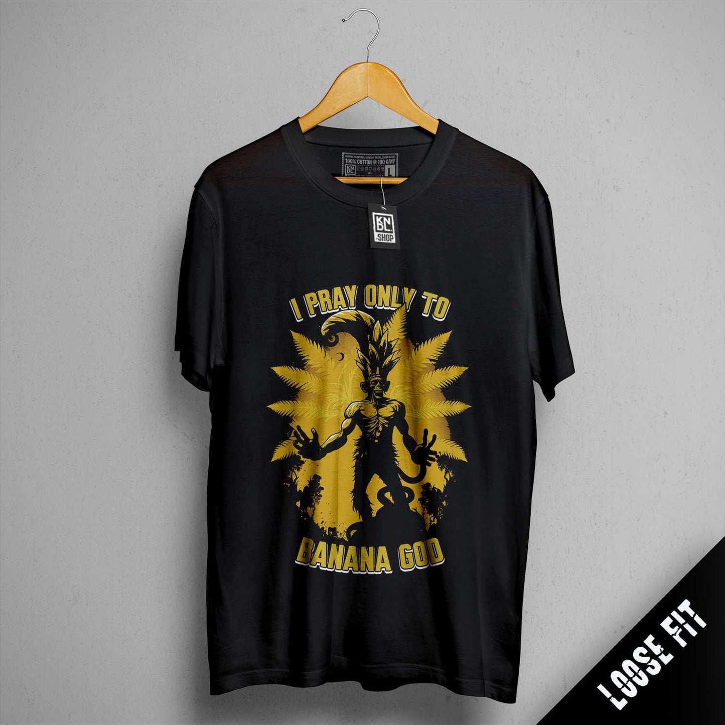 a black t - shirt with a picture of a man holding a sword