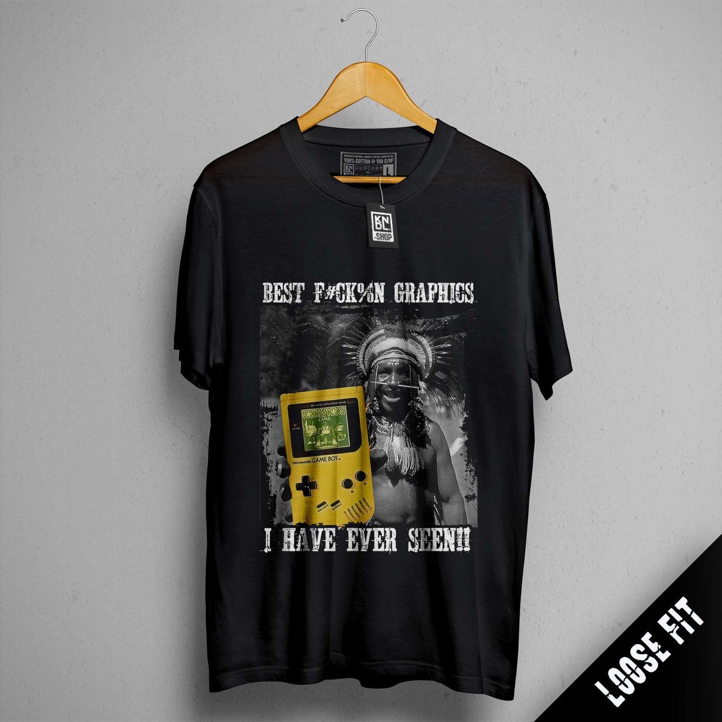 a t - shirt with a picture of a man holding a game controller