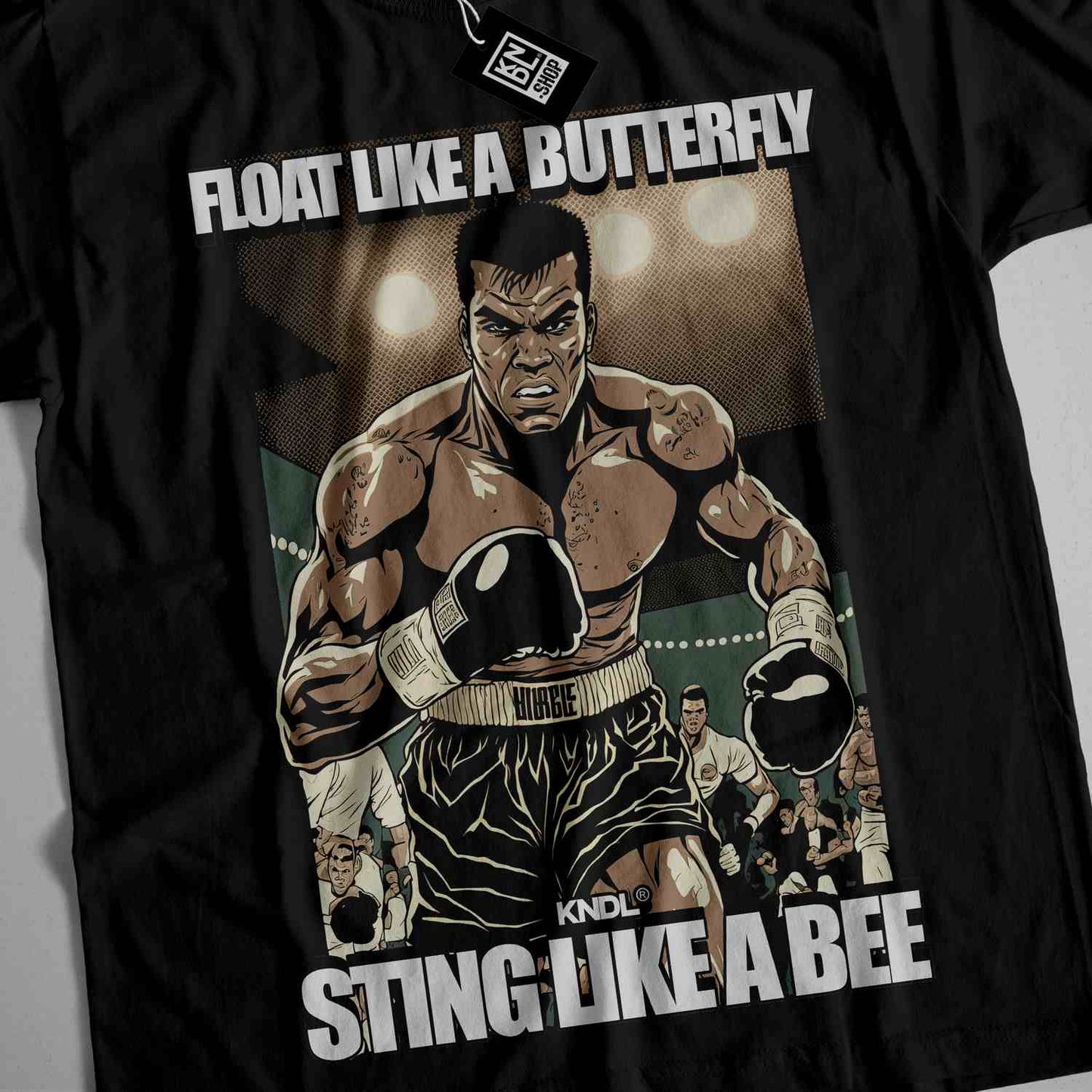 a t - shirt with a picture of a boxer on it