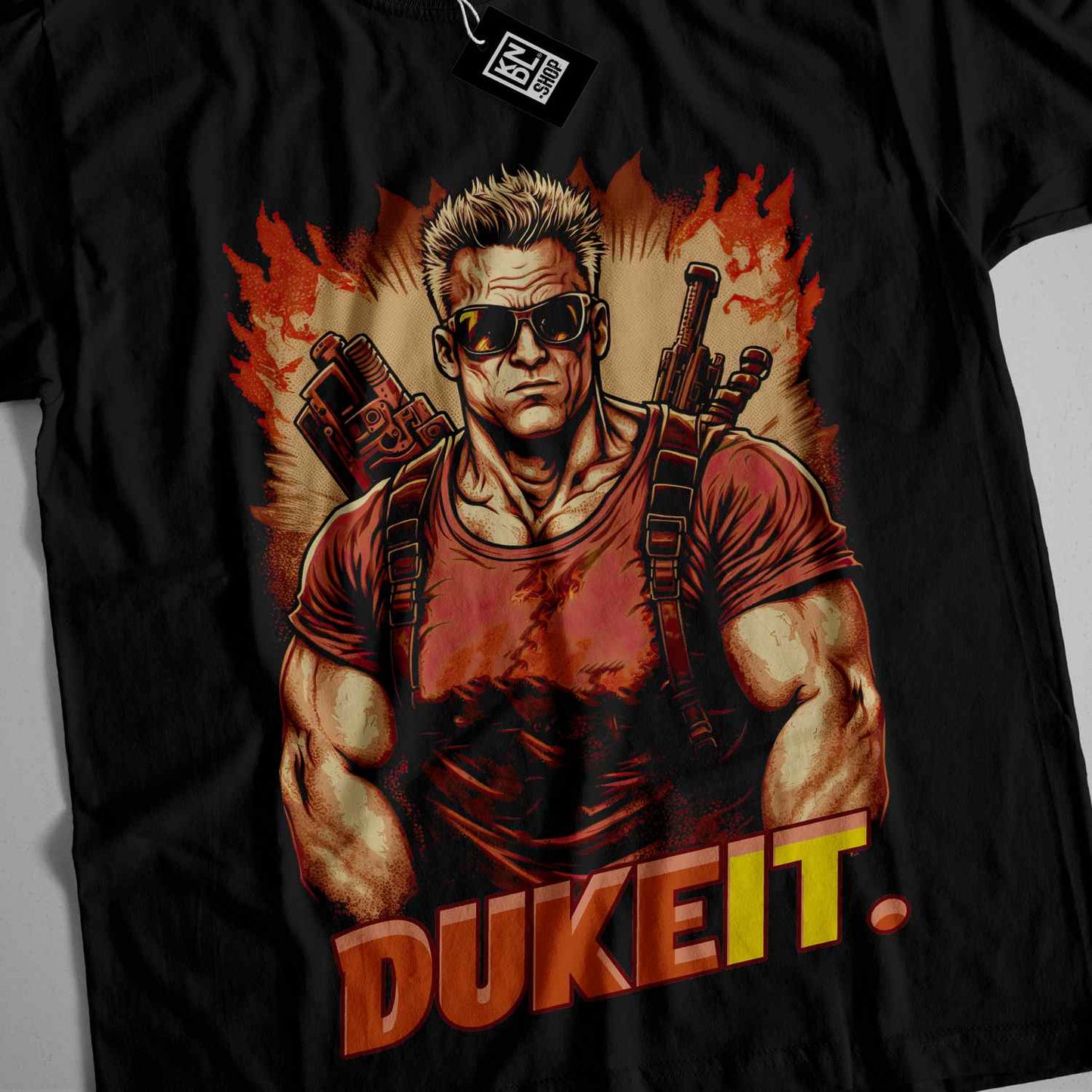 a black shirt with a picture of a man holding guns