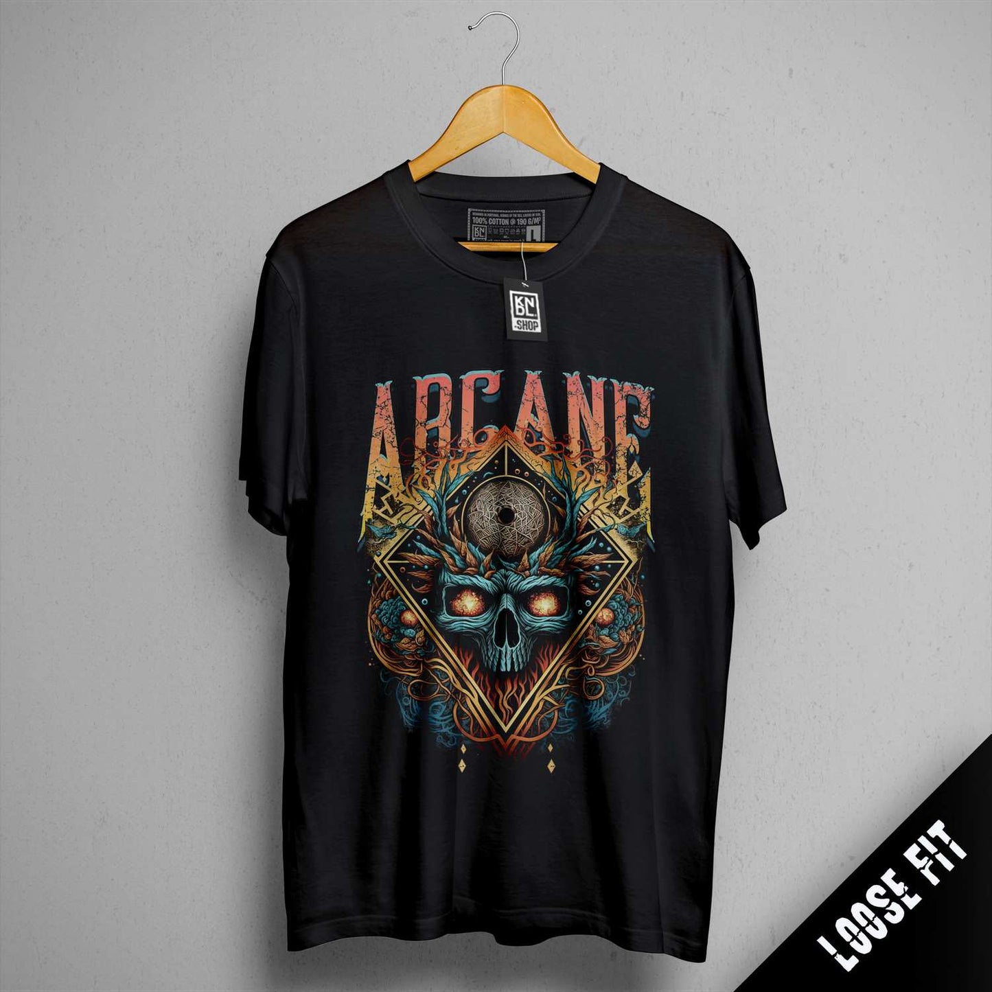 a black t - shirt with an image of a skull on it