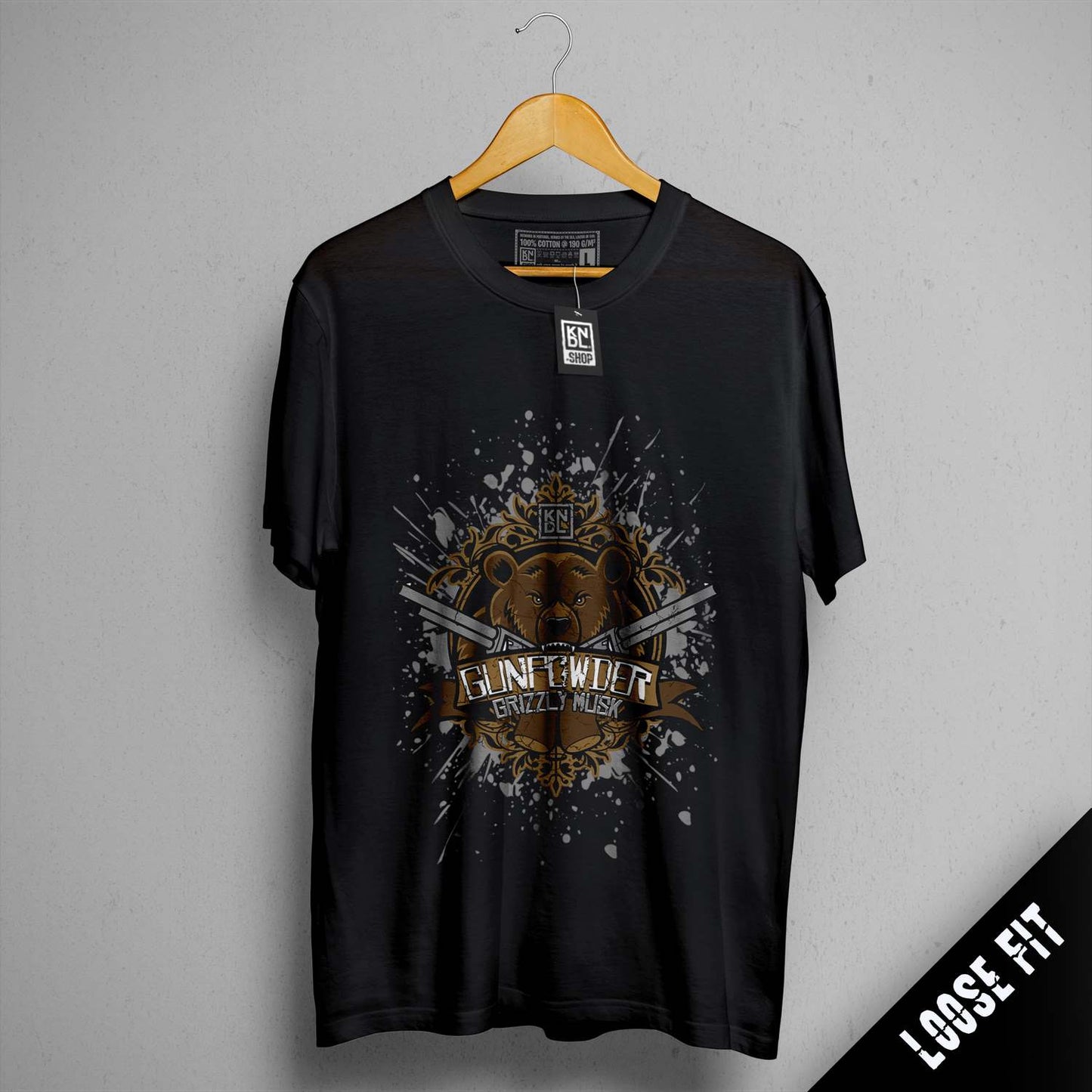 a black t - shirt with a lion on it