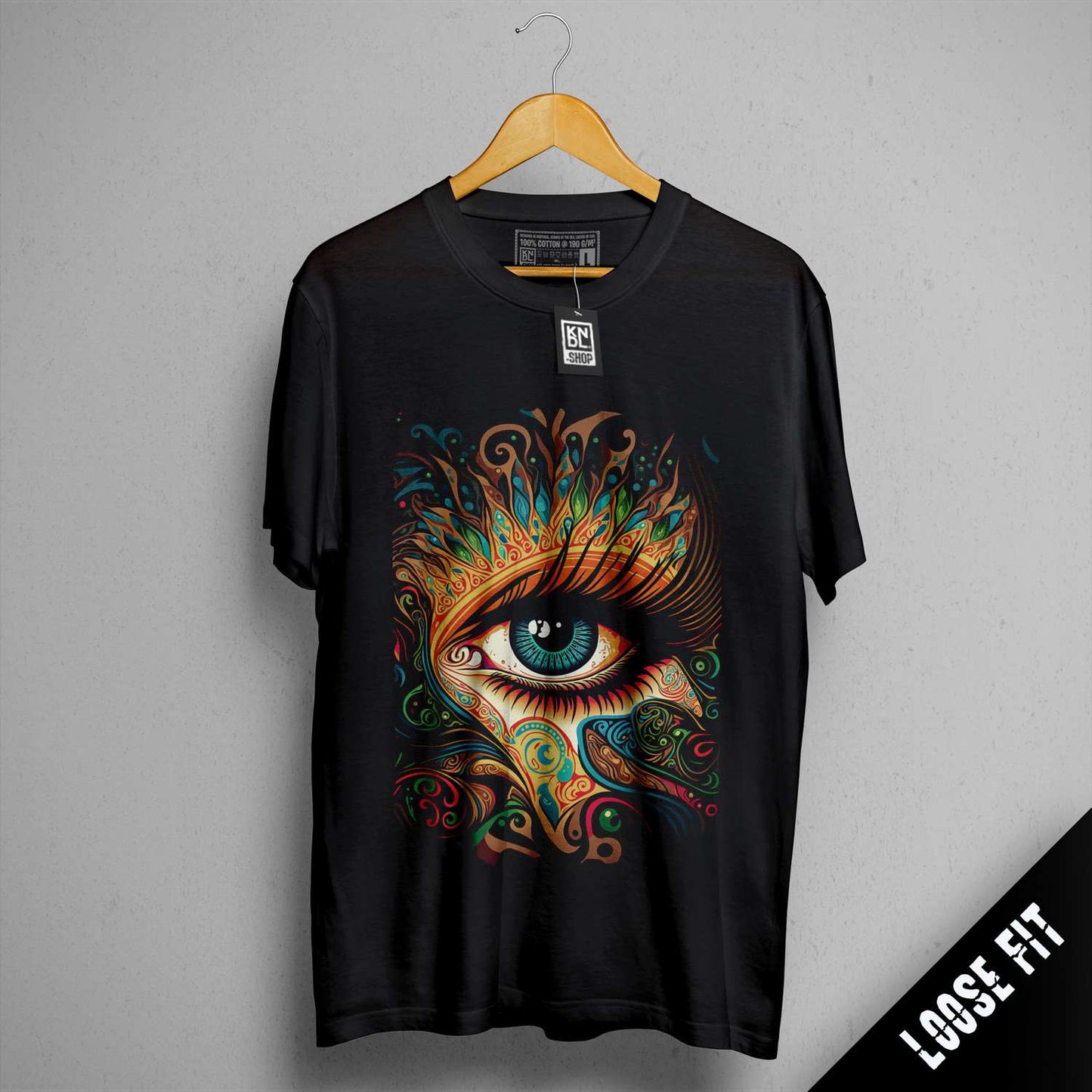 a black t - shirt with an eye on it