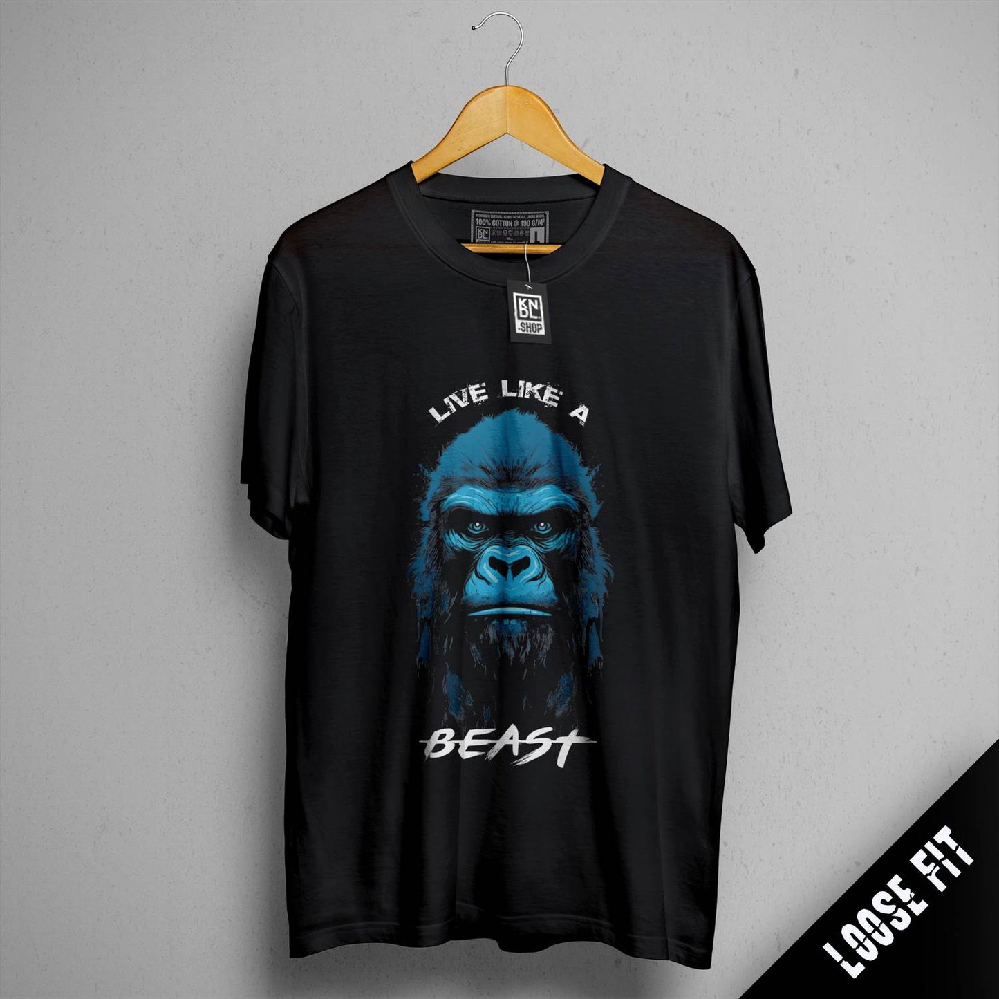 a black t - shirt with a gorilla face on it