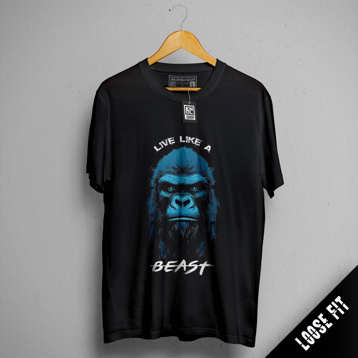 a black t - shirt with a gorilla face on it