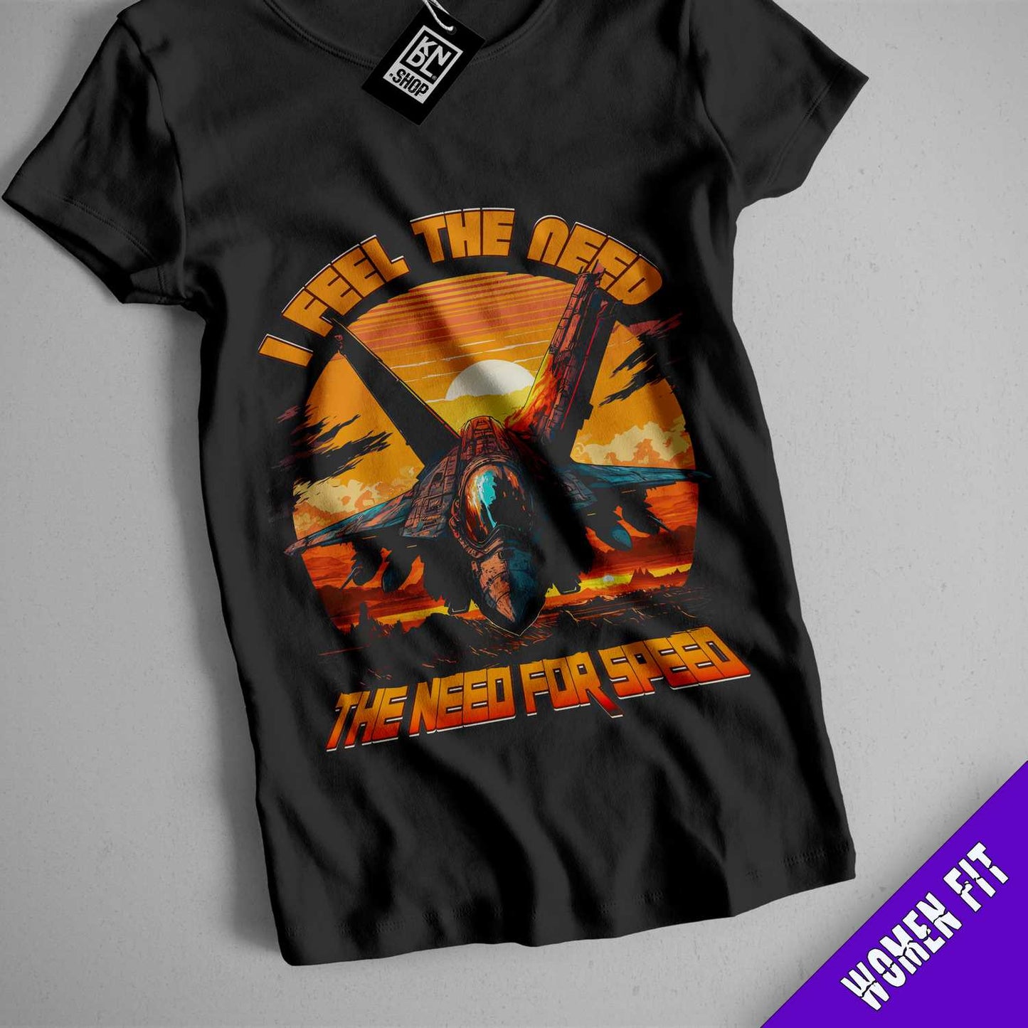 a black t - shirt with a picture of a fighter jet