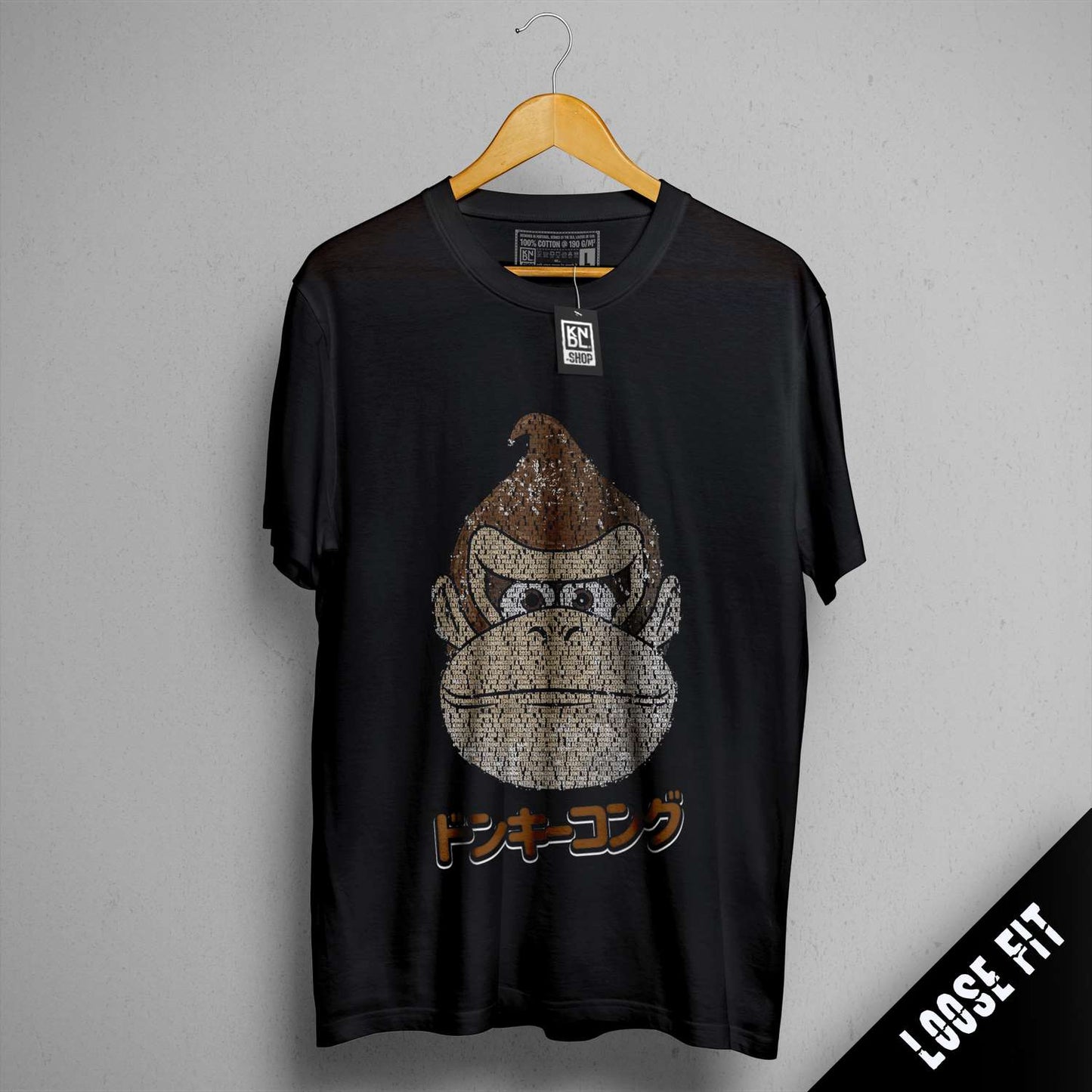 a black t - shirt with a picture of a monkey on it