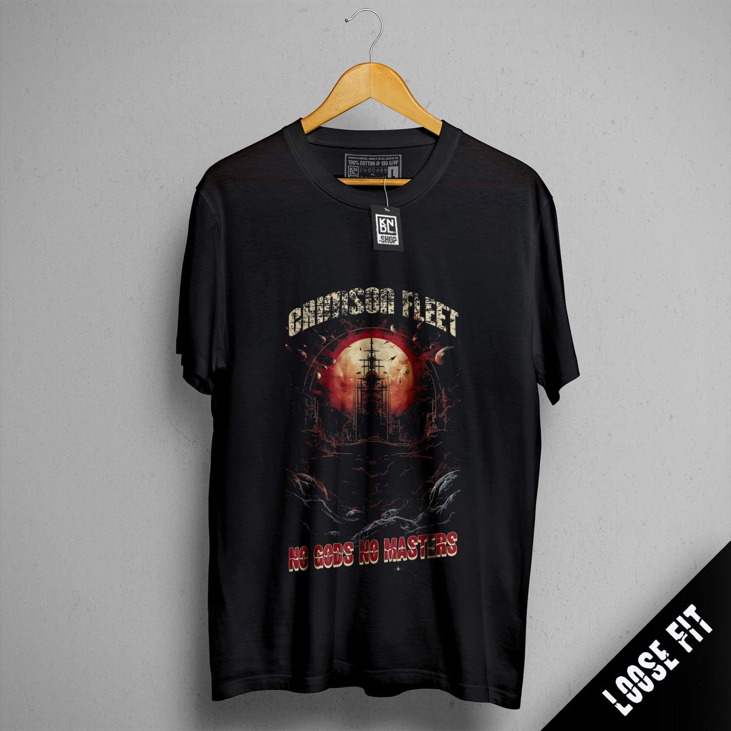a black shirt with a picture of a ship on it