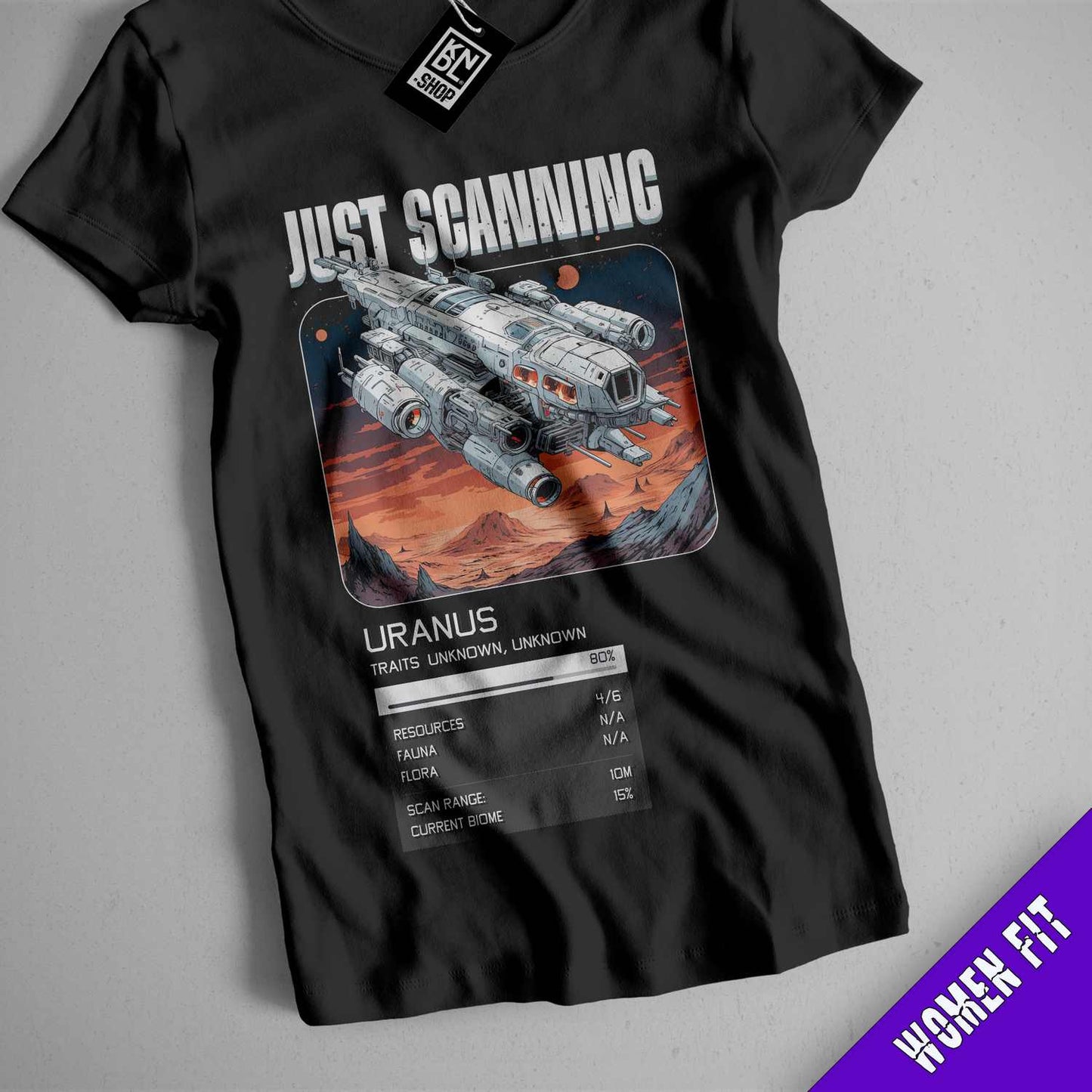 a black t - shirt with a picture of a space ship on it