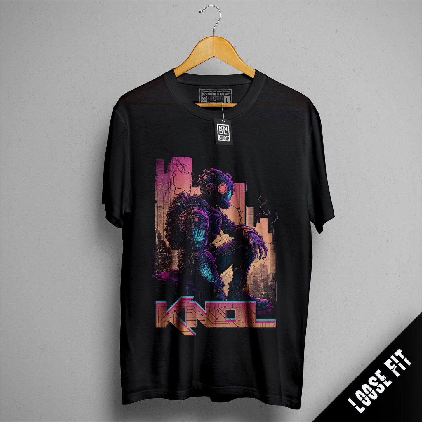 a t - shirt with a picture of a man holding a gun
