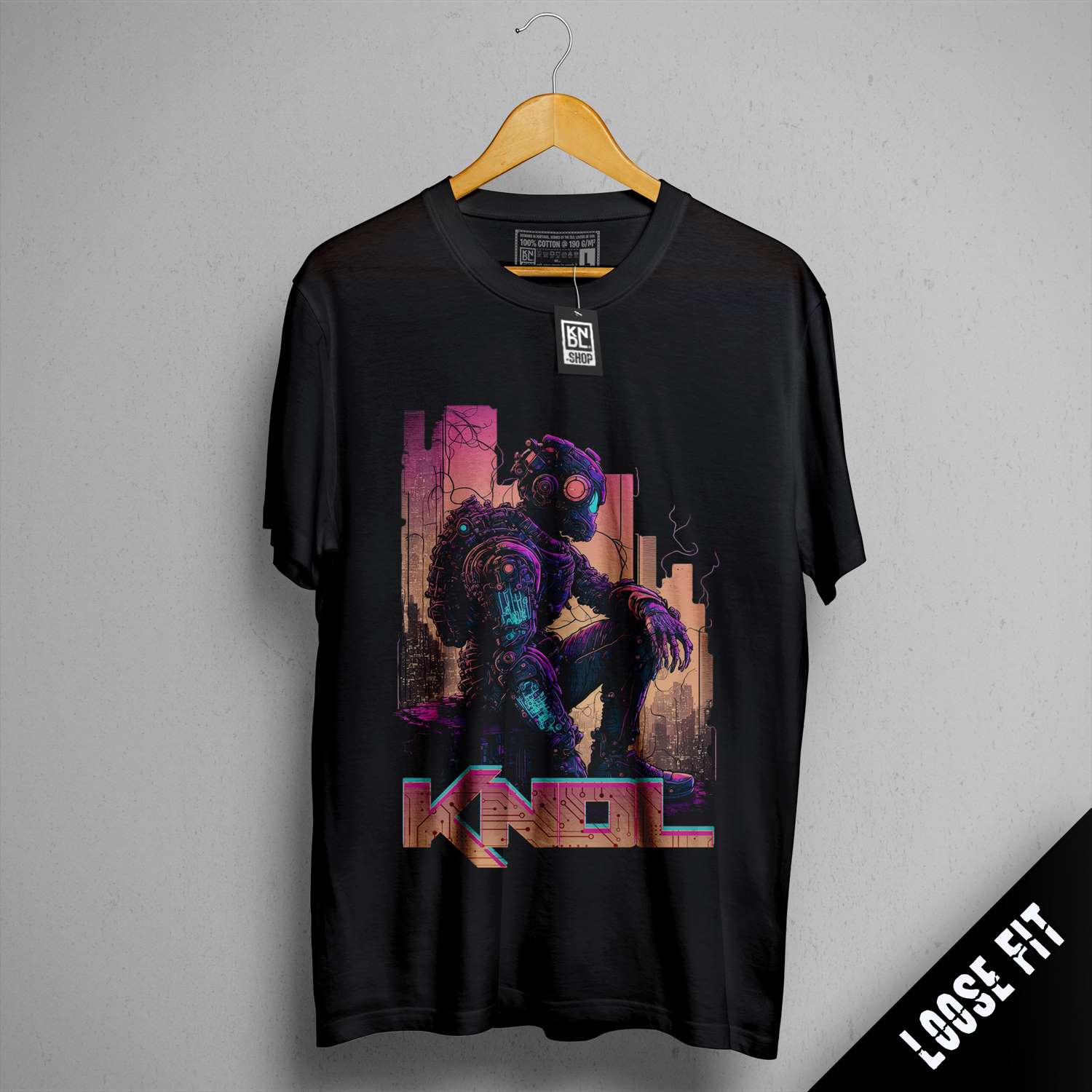 a t - shirt with a picture of a man holding a gun