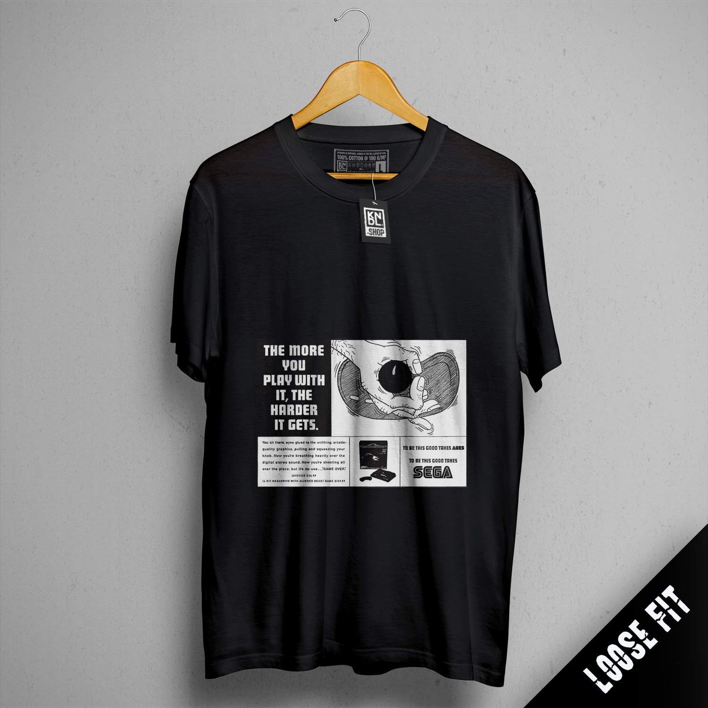 a black t - shirt with a picture of a man's face on it