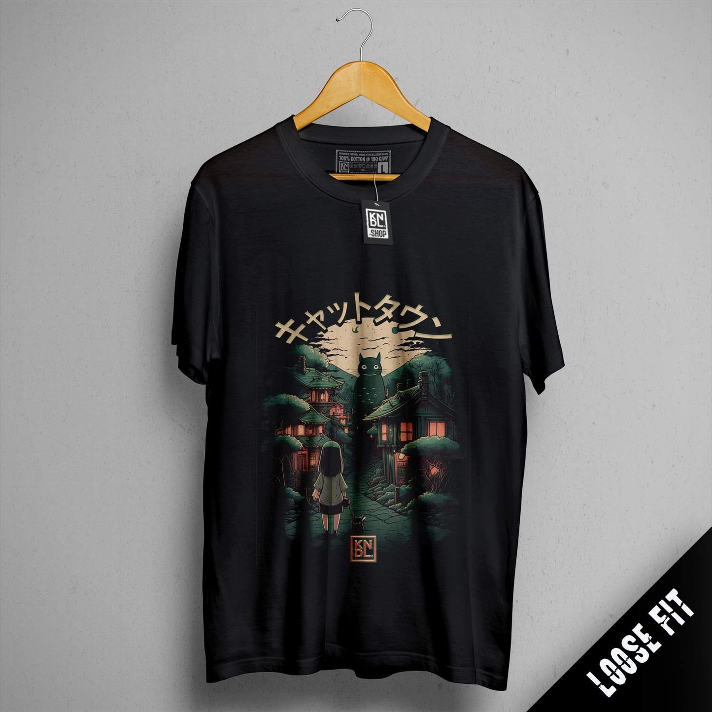 a black t - shirt with a picture of a man standing in front of a