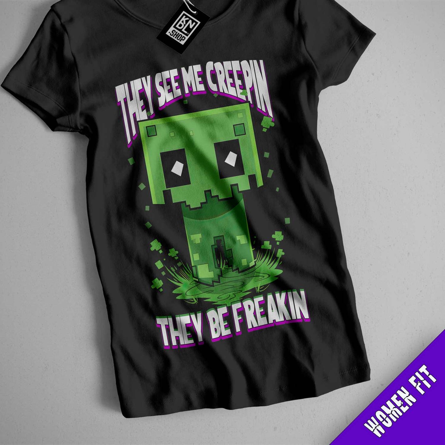 a t - shirt with an image of a green monster on it