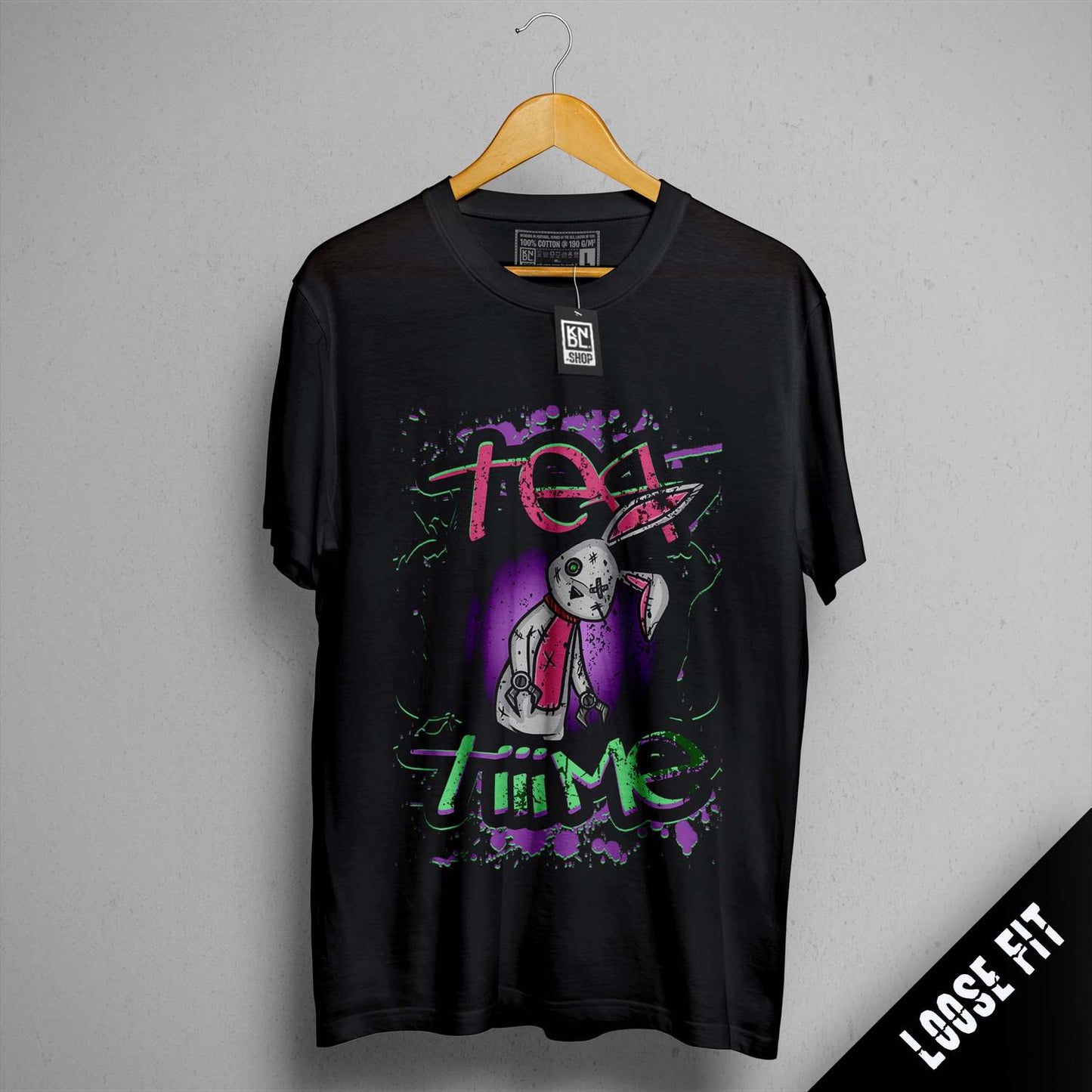 a black t - shirt with a picture of a cat on it