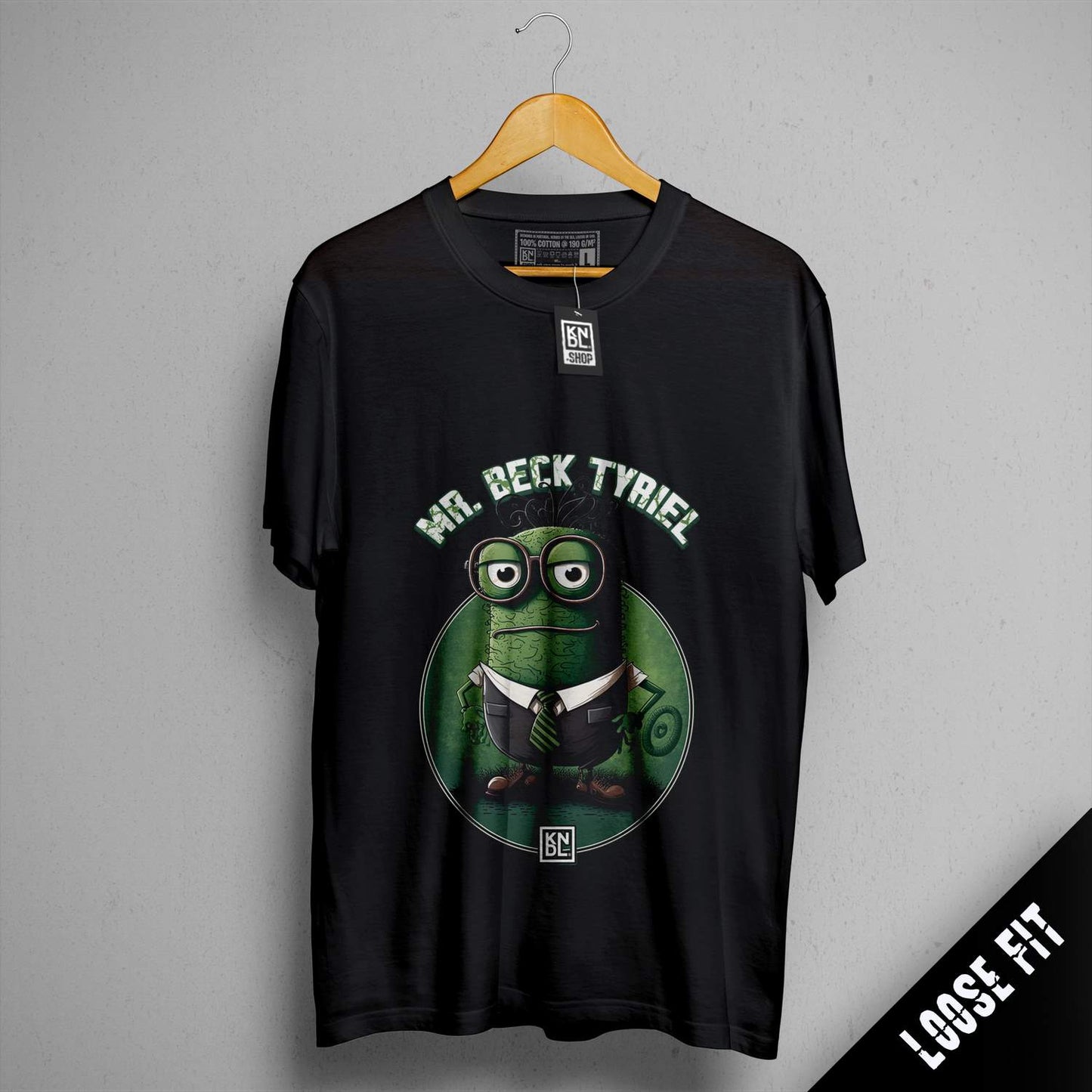 a black t - shirt with an image of a cartoon character on it