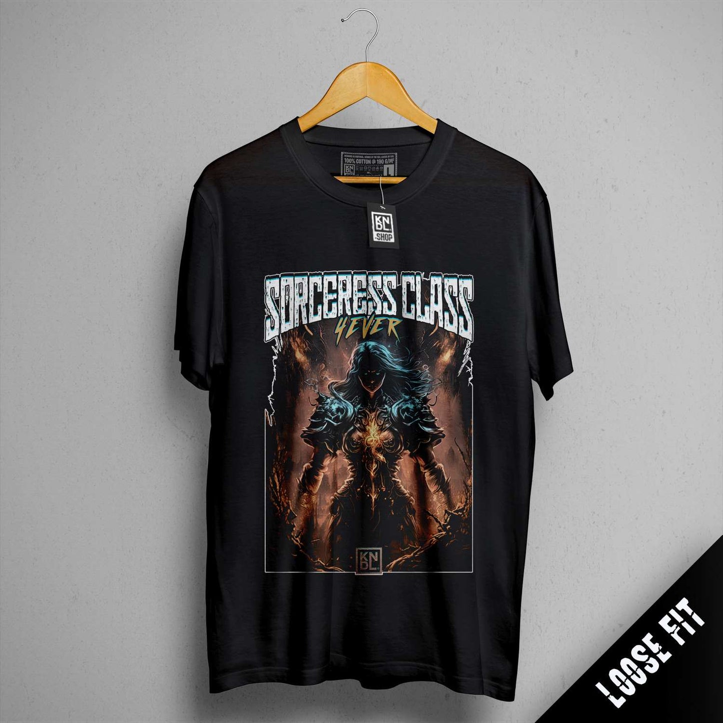 a black t - shirt with a picture of a demonic creature on it