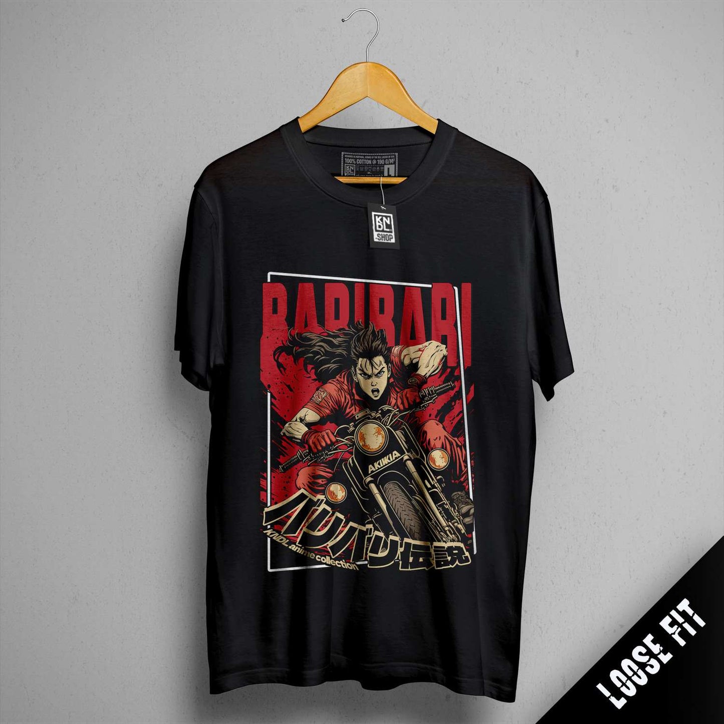 a black shirt with a picture of a man riding a motorcycle