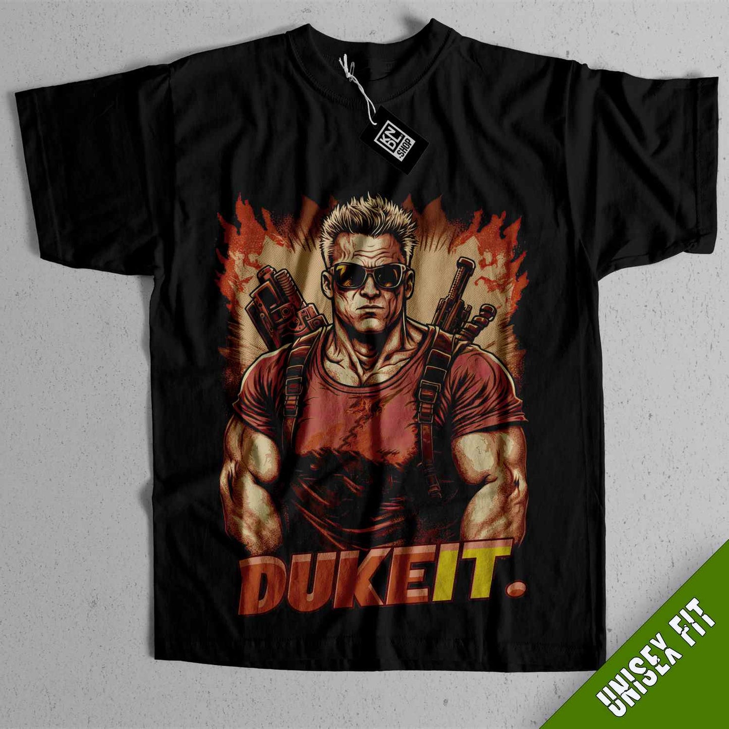 a black t - shirt with a picture of a man holding guns
