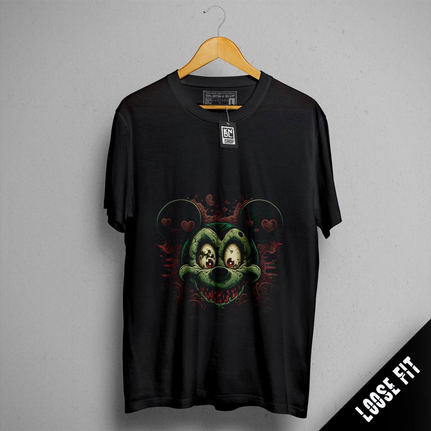 a black t - shirt with a picture of a bear on it