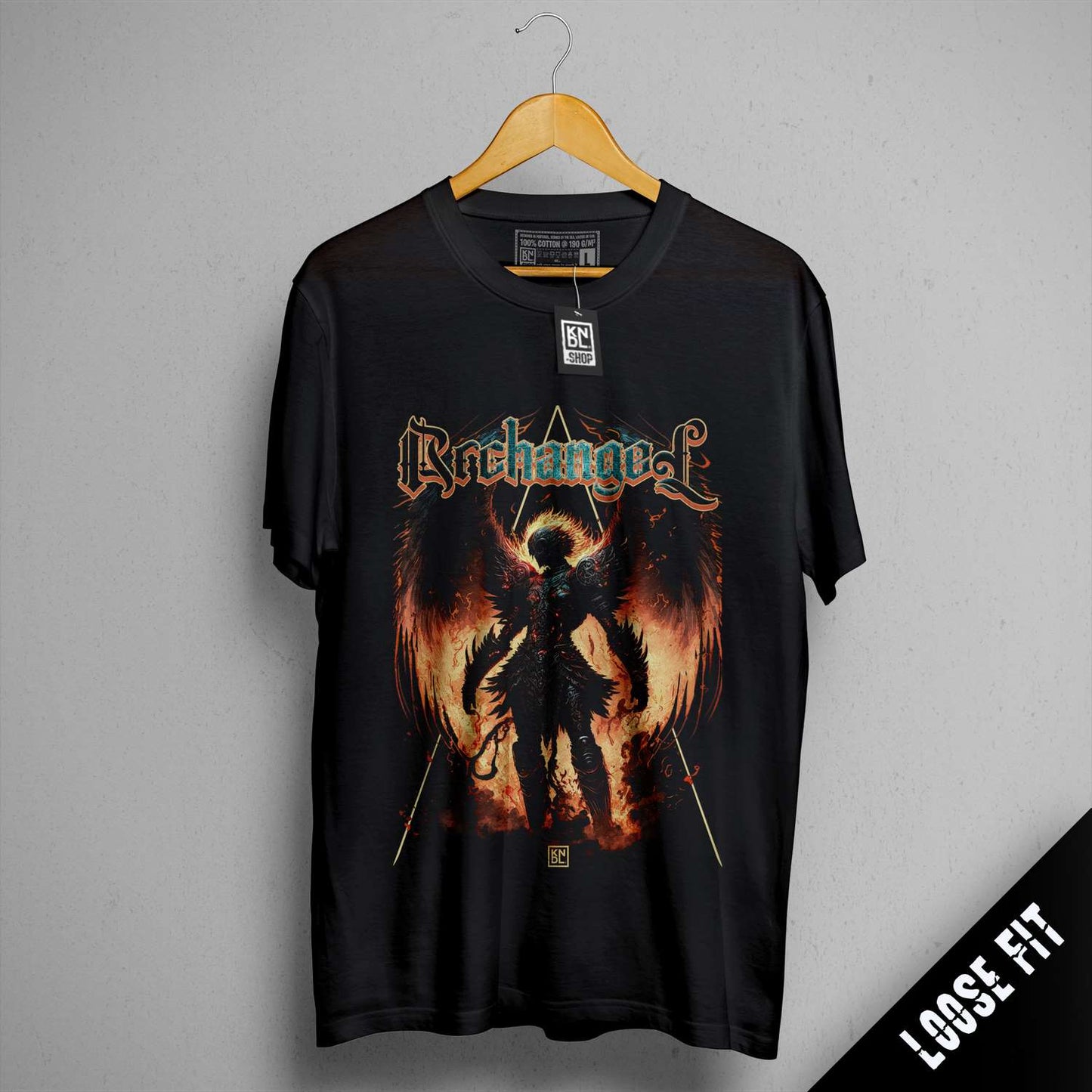 a black shirt with a picture of a demon on it