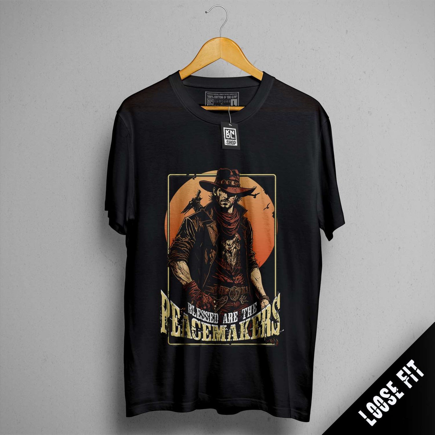 a black t - shirt with a picture of a cowboy on it