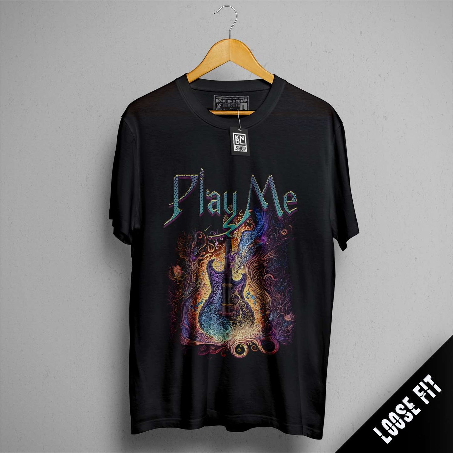 a black t - shirt with the words play me on it