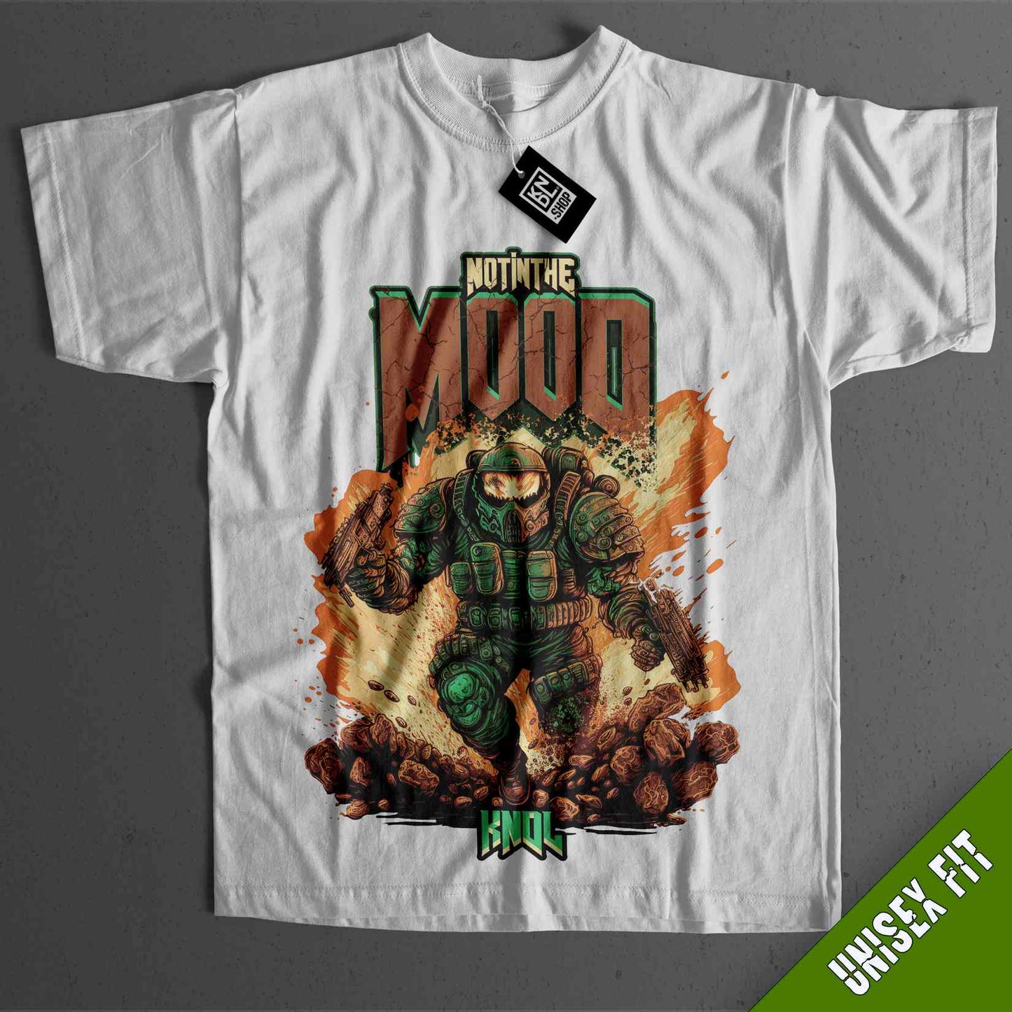 a white t - shirt with an image of a green monster on it