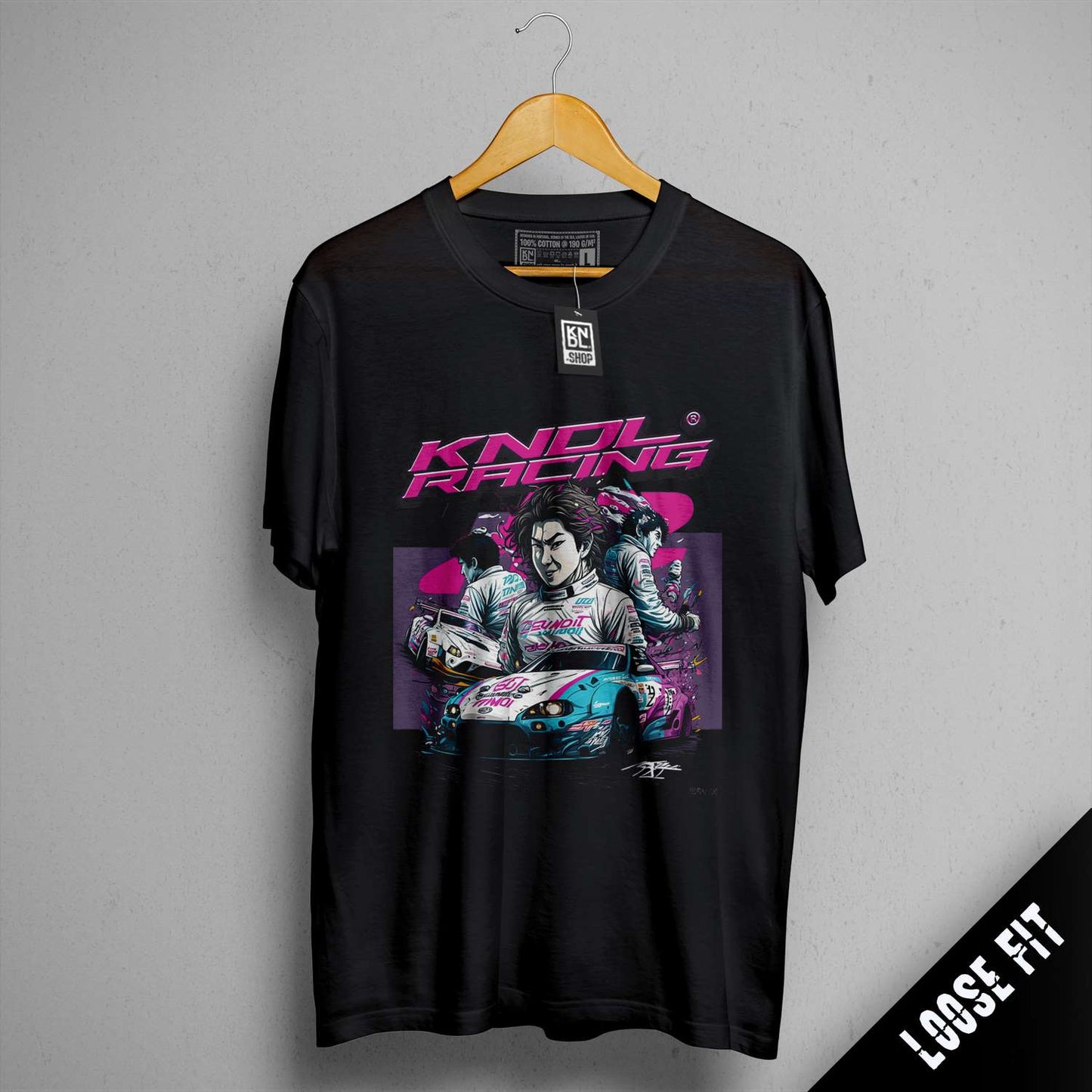 a black t - shirt with a picture of a man holding a skateboard