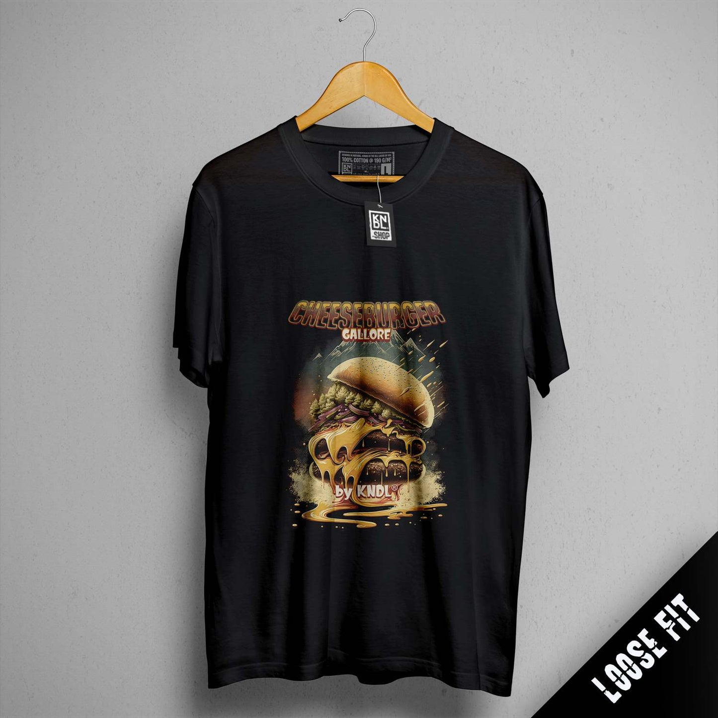 a black t - shirt with a picture of a skull on it
