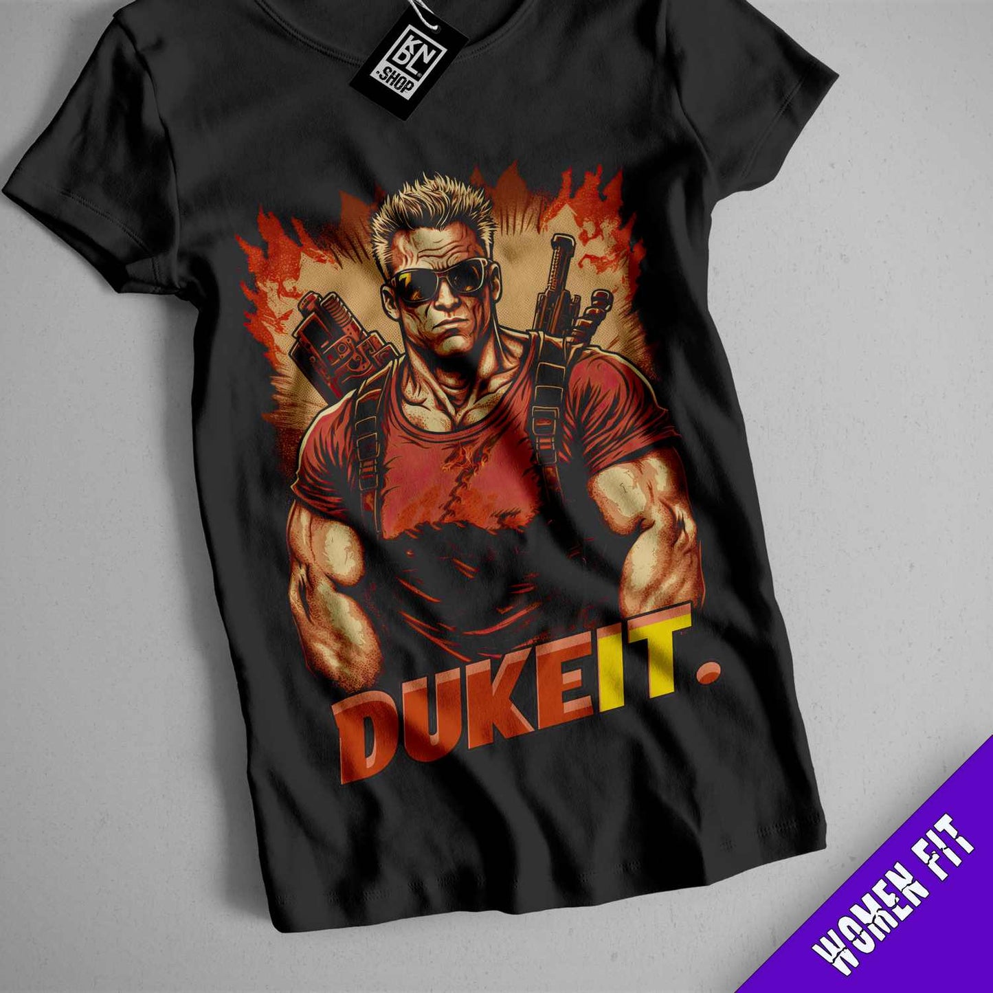 a t - shirt with a picture of a man holding guns