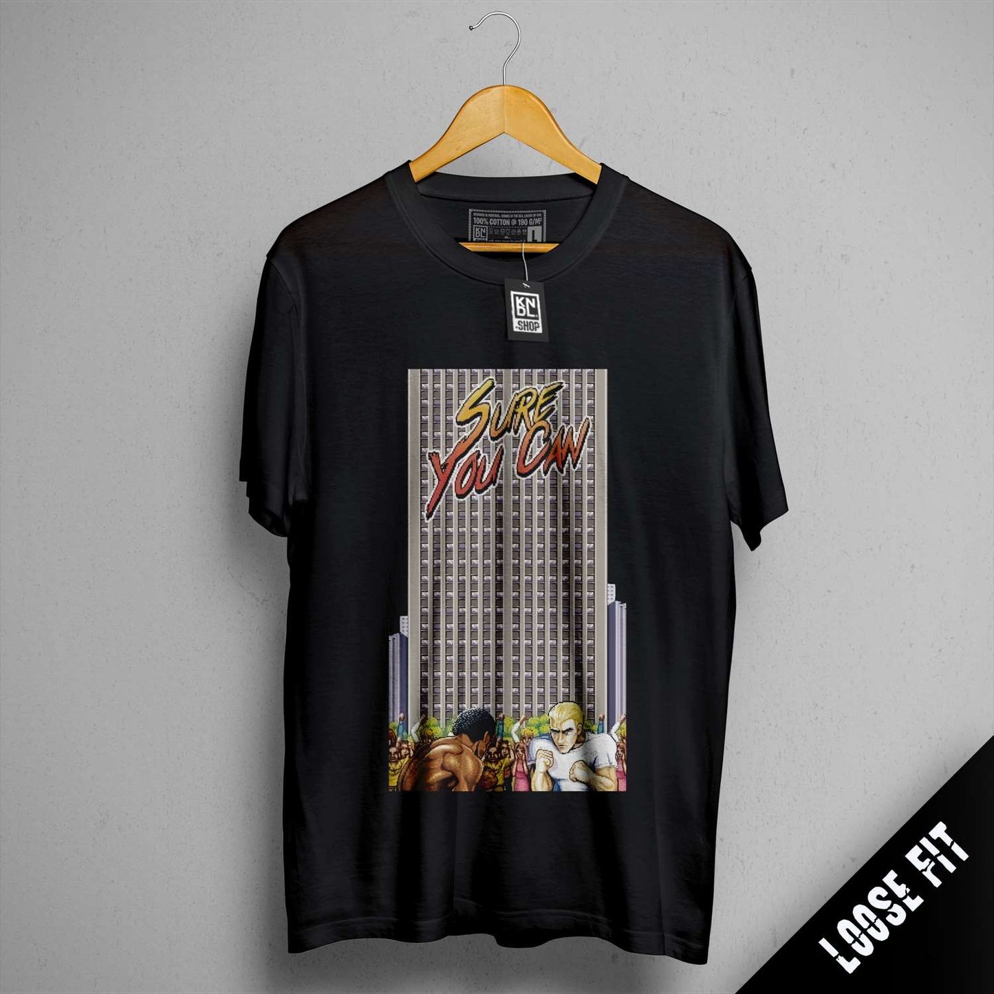 a t - shirt hanging on a wall with a picture of a city