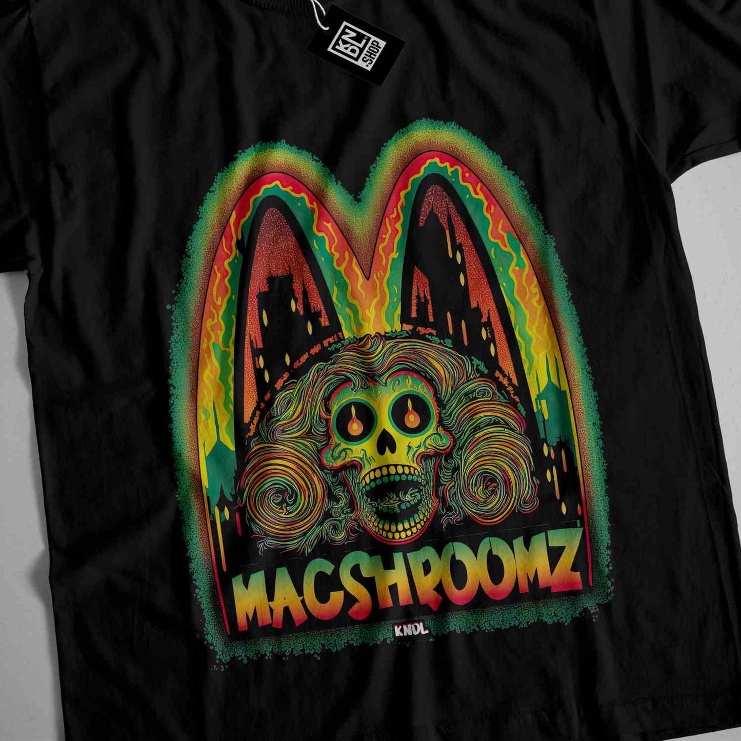 a black t - shirt with a picture of a skull on it