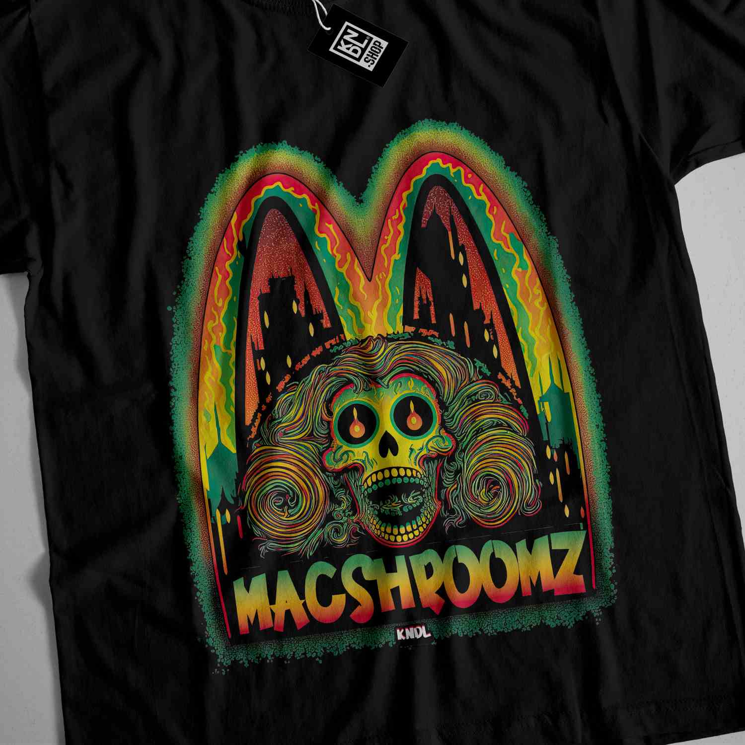 a black t - shirt with a picture of a skull on it