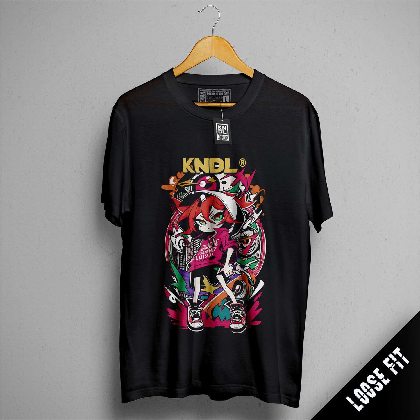 a black t - shirt with a picture of a girl on it