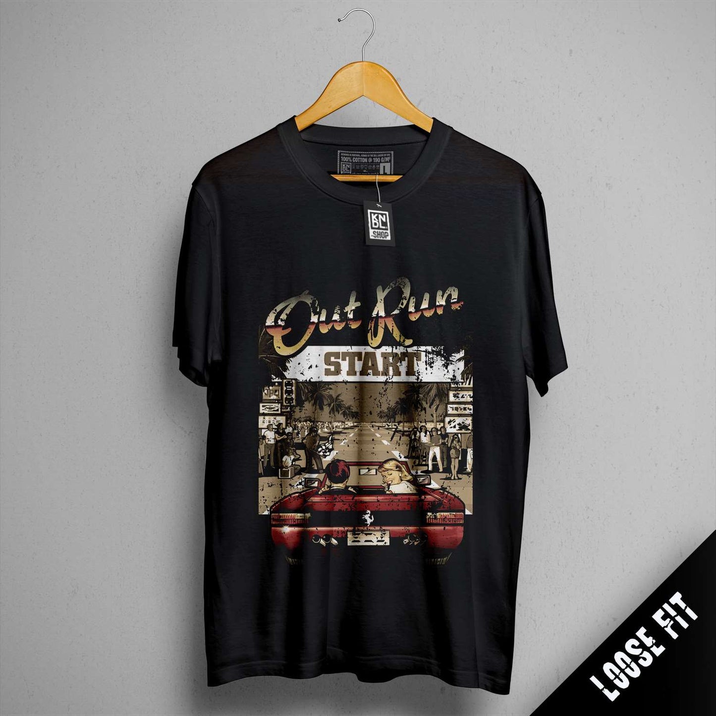 a black shirt with a picture of a red car on it