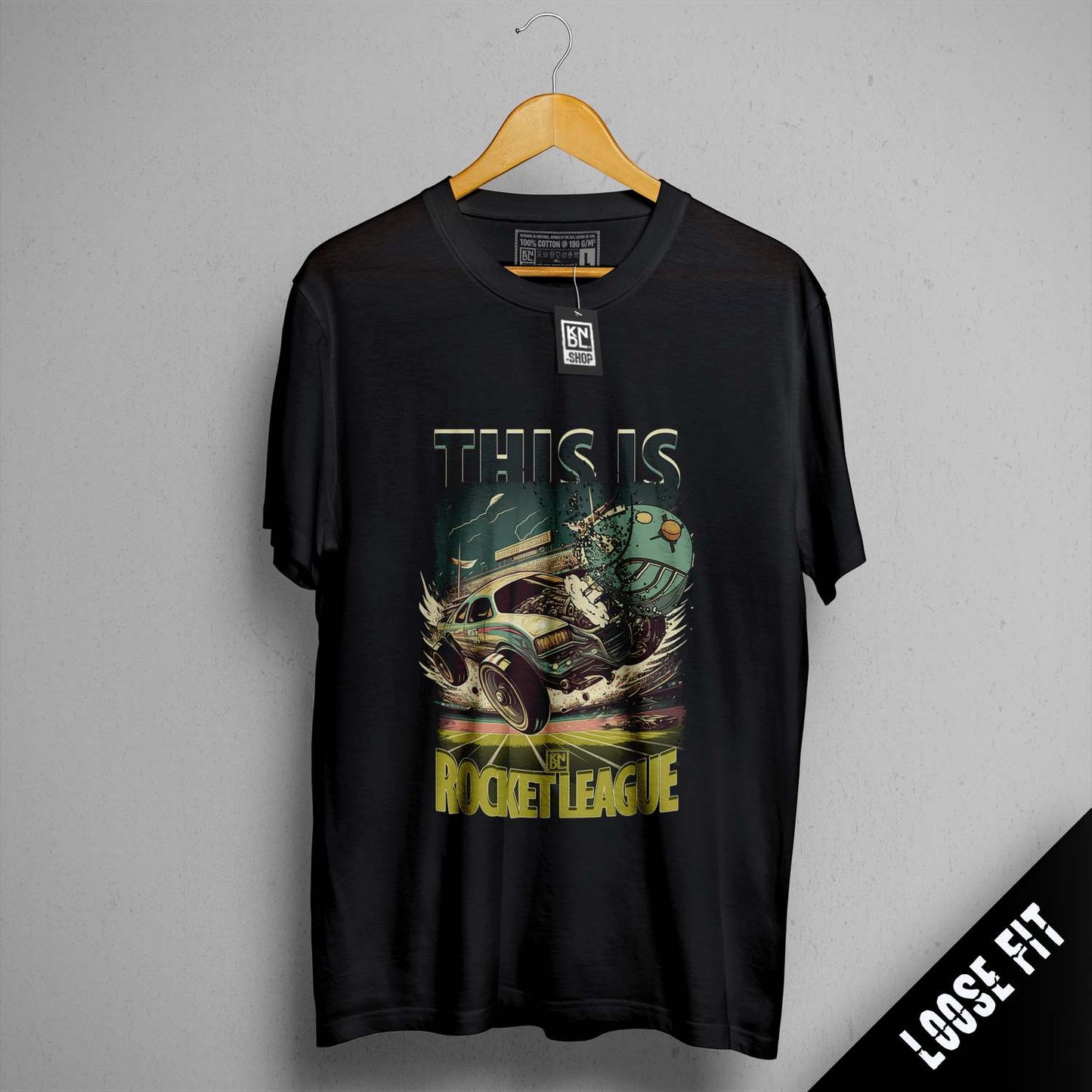 a black t - shirt with a picture of a boat on it
