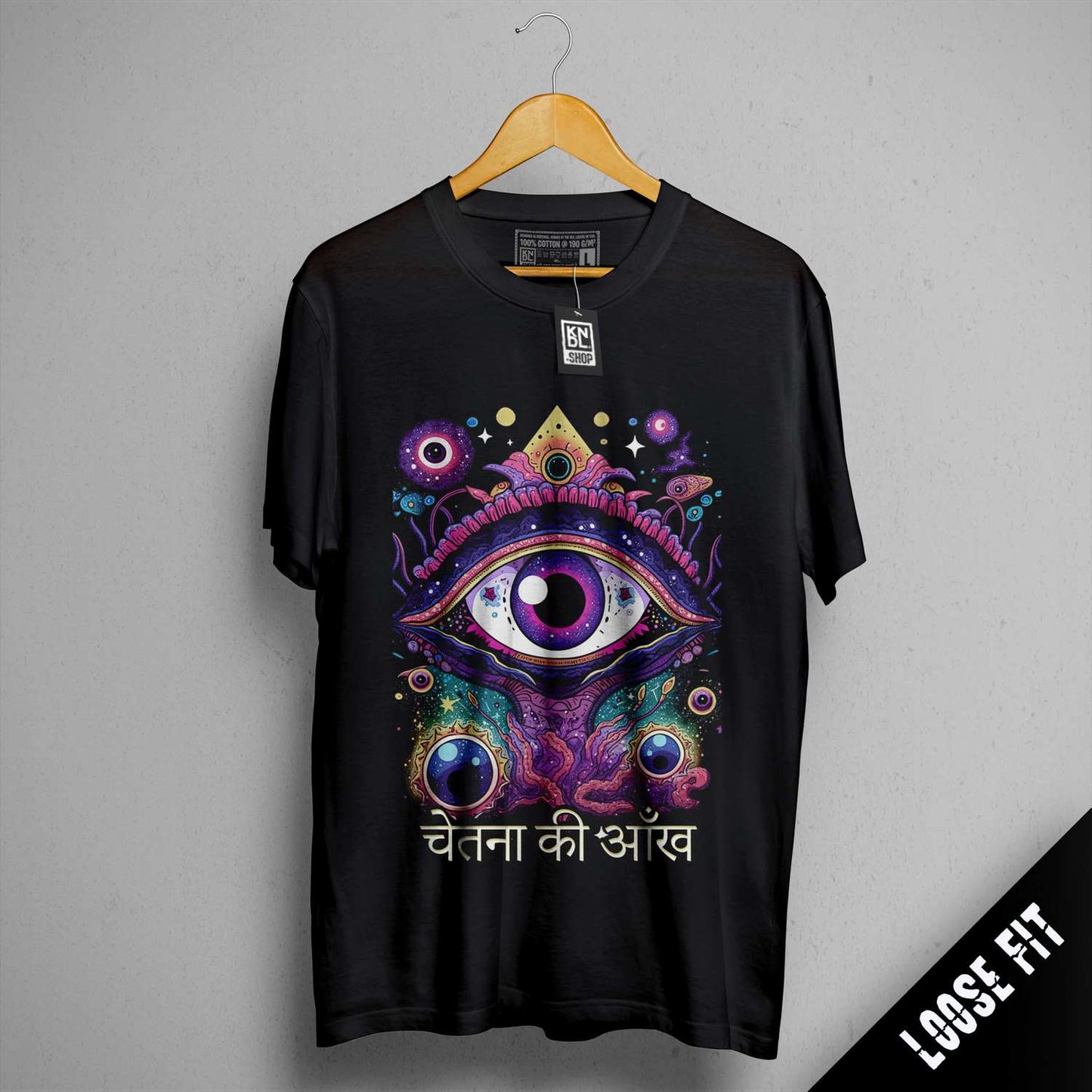 a black t - shirt with an eye on it
