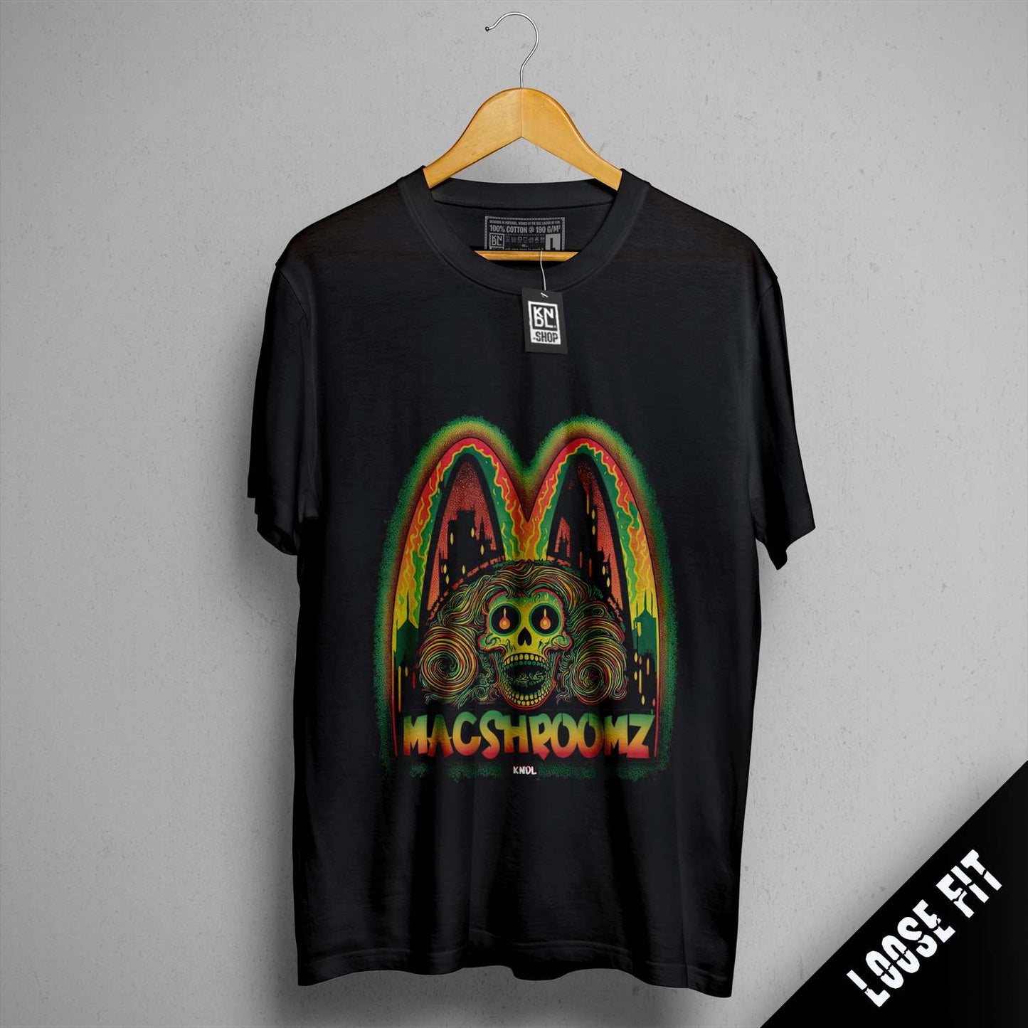 a black shirt with a picture of a monster on it