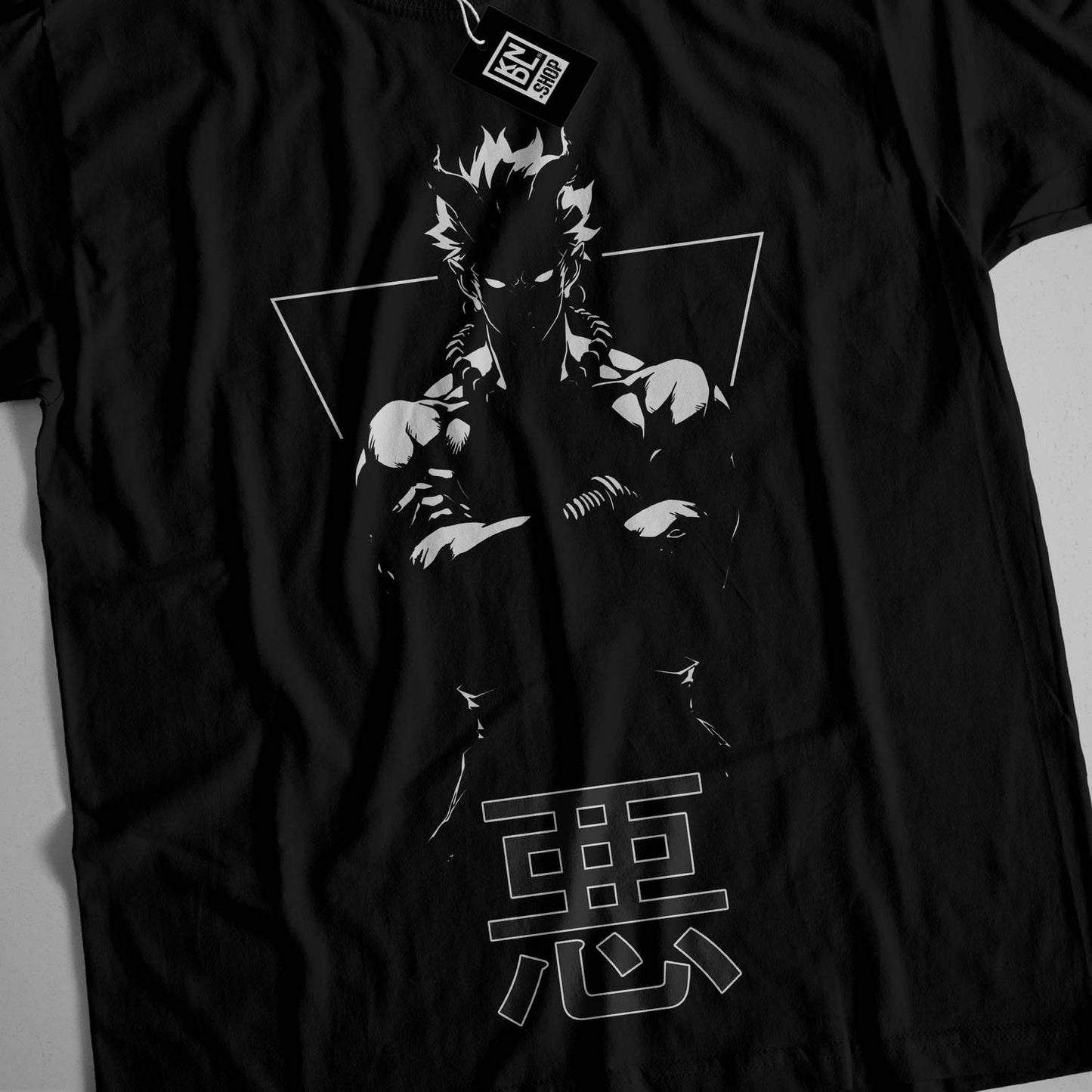 a black t - shirt with a picture of a man holding a knife
