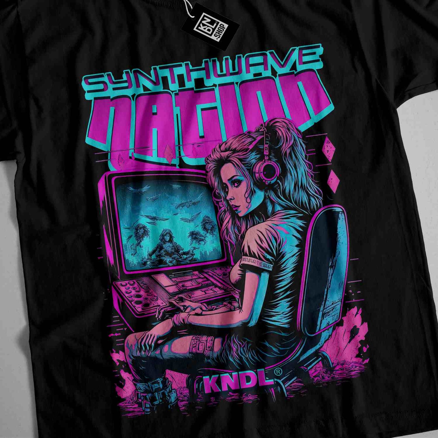 a black t - shirt with a picture of a woman sitting in front of a