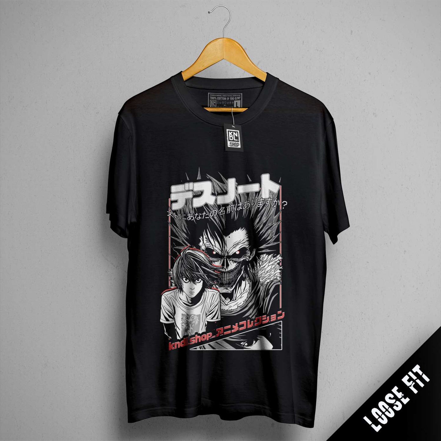 a black t - shirt with a picture of two people on it