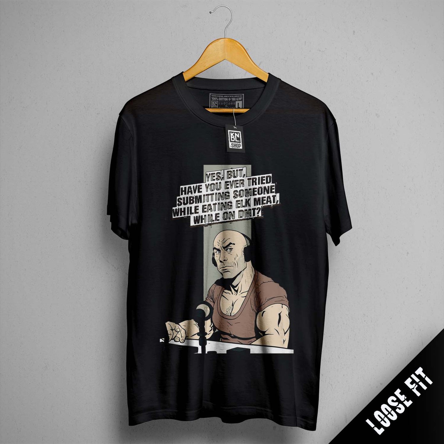 a t - shirt with a picture of a man holding a gun