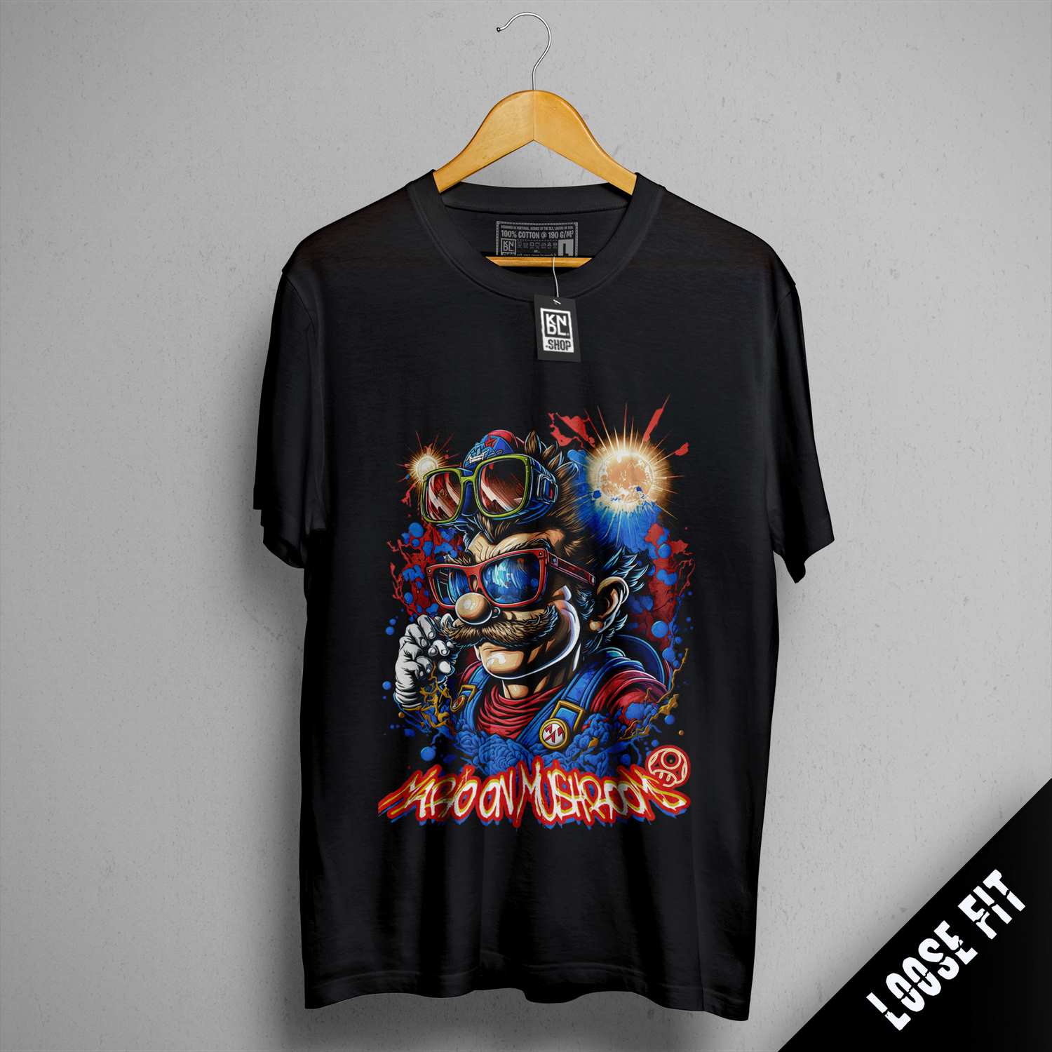 a black t - shirt with an image of a robot holding a gun
