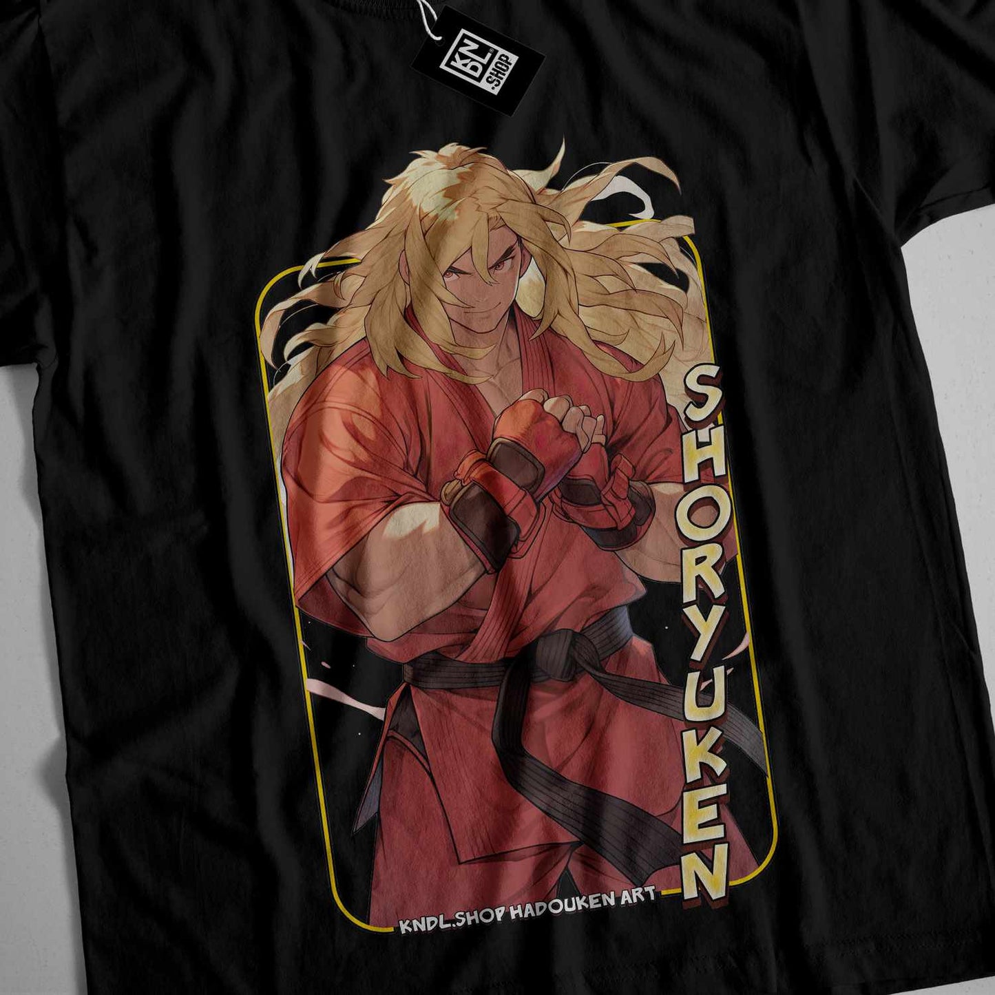 a black t - shirt with a picture of a woman holding a sword