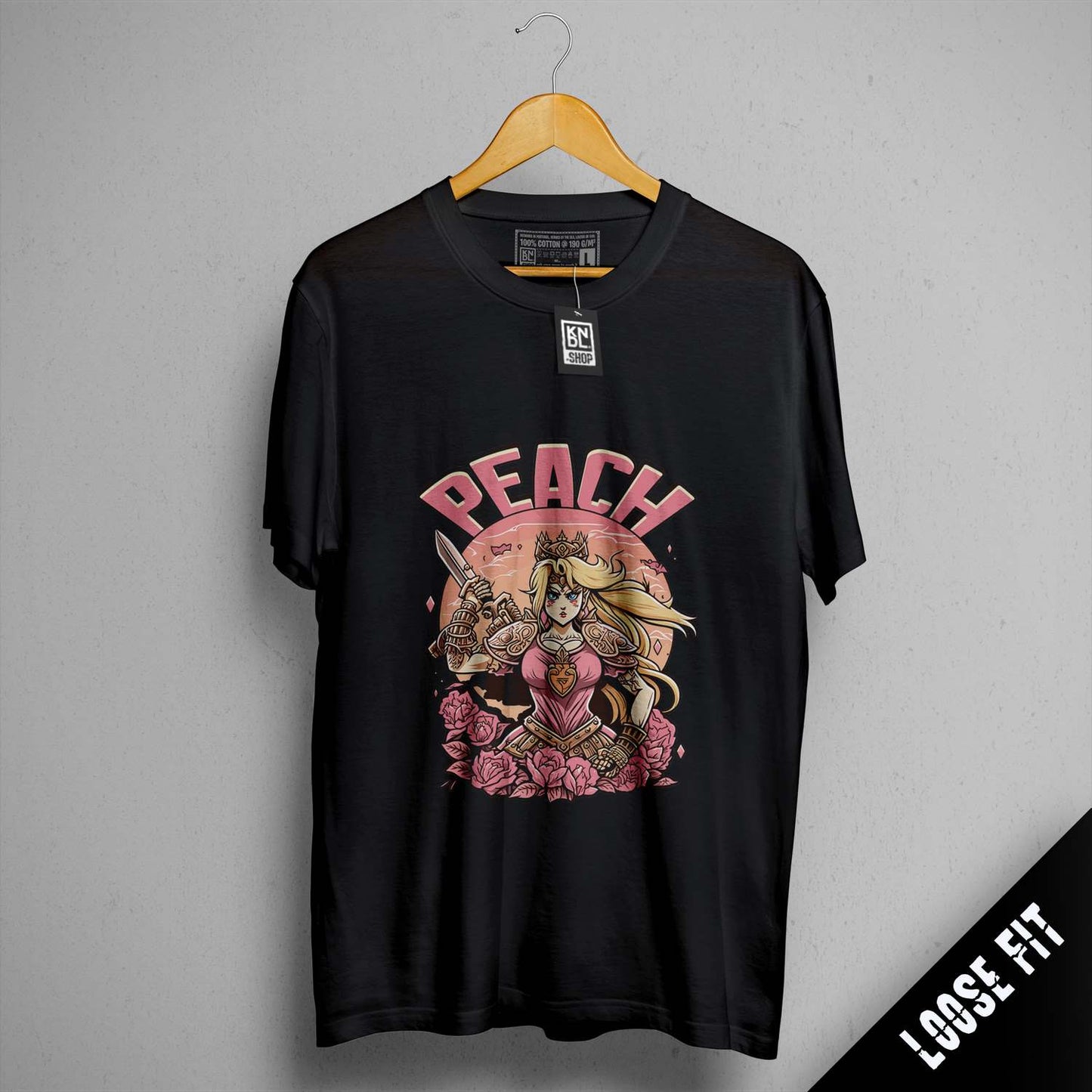 a black t - shirt with a picture of a girl and a demon on it