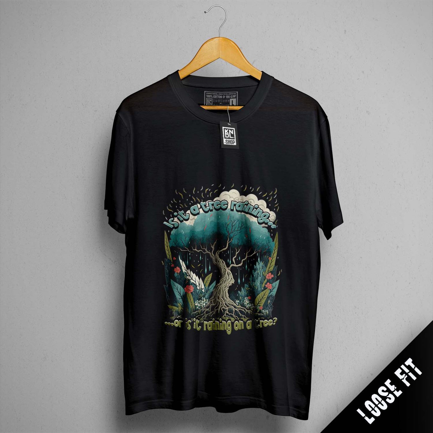 a black t - shirt with a picture of a tree on it