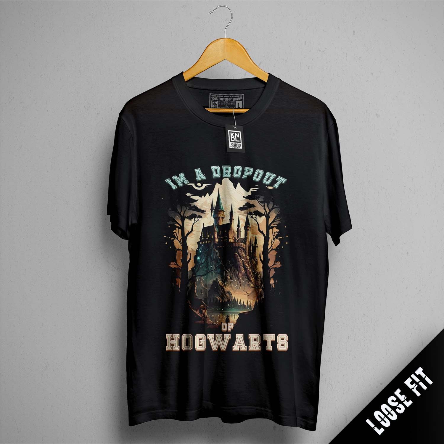 a black t - shirt with a picture of a man riding a horse