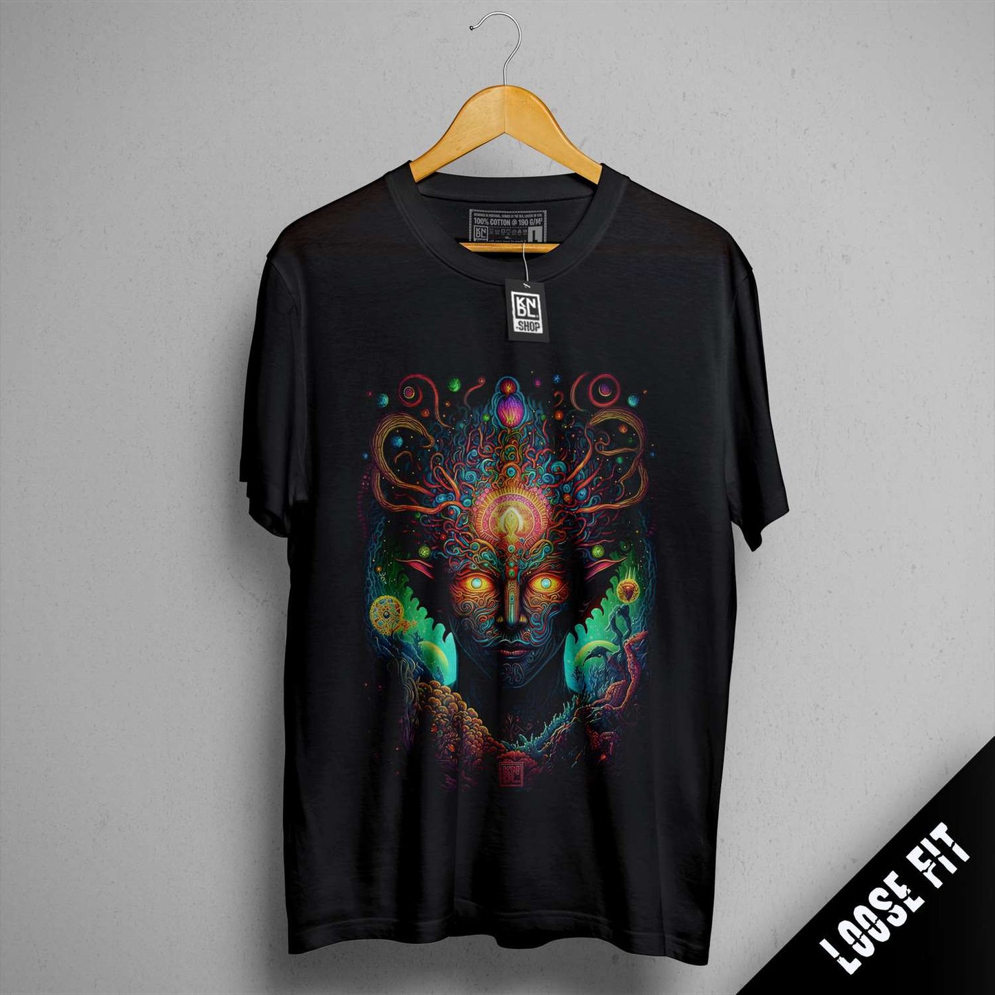 a black t - shirt with an image of a woman's face on it